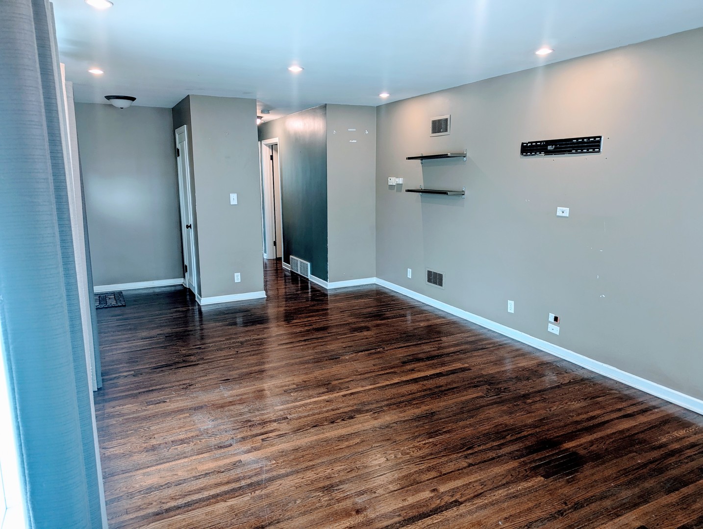 515 South Cedar Road New Lenox, IL 60451 - Photo 5 of 19 an empty room with wooden floor and windows