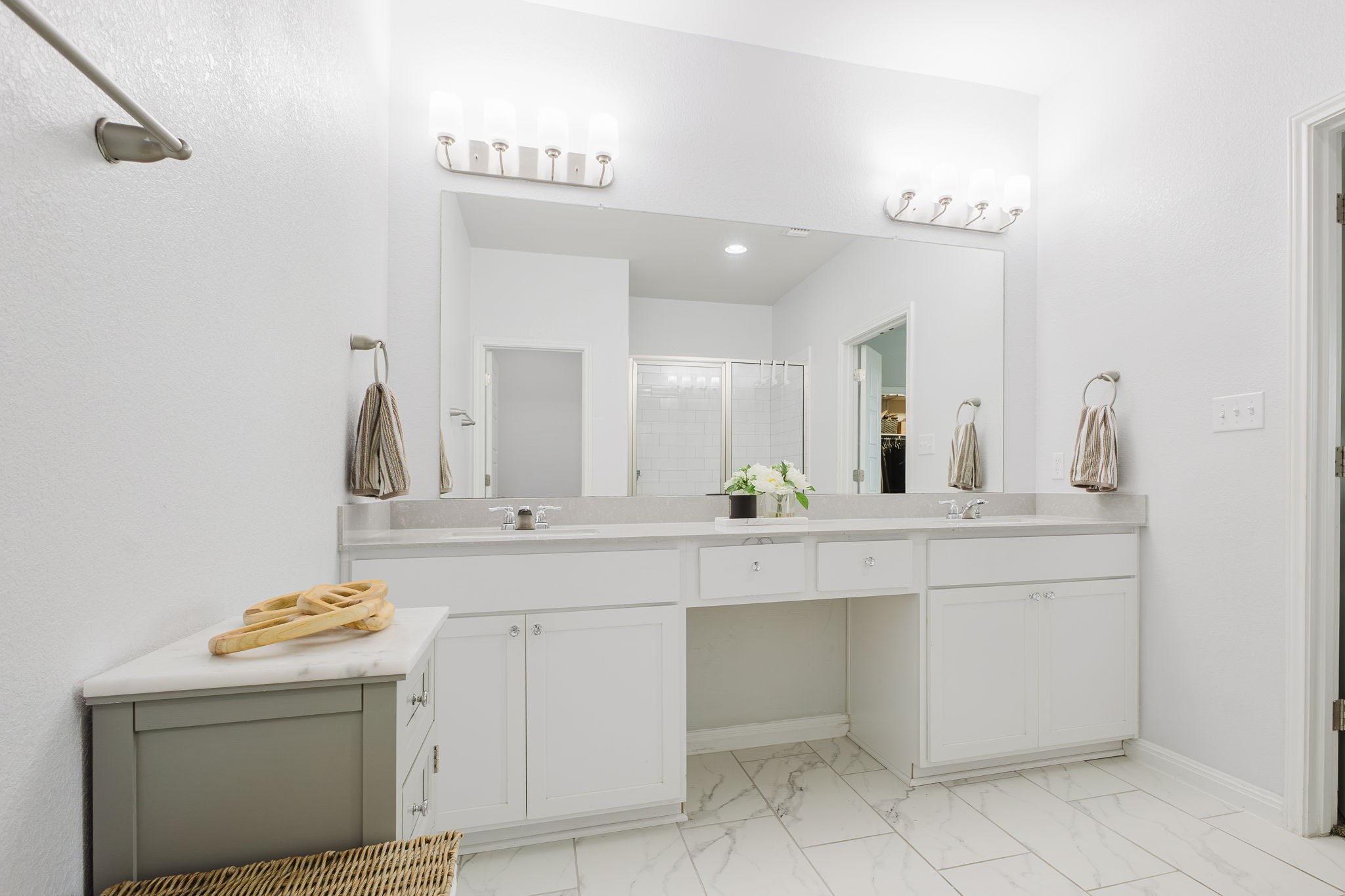 307 Watercourse Way Bastrop, TX 78602 - Photo 15 of 35 a bathroom with a sink and a mirror