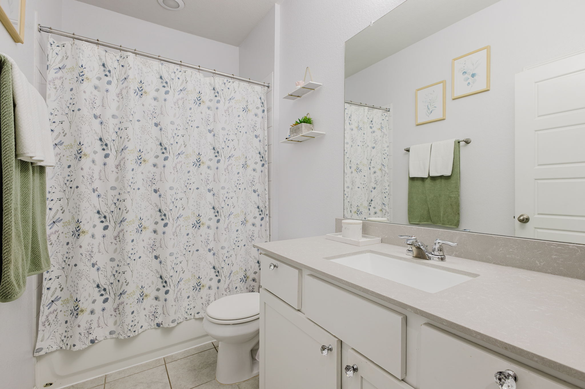 307 Watercourse Way Bastrop, TX 78602 - Photo 20 of 35 a bathroom with a sink toilet and shower