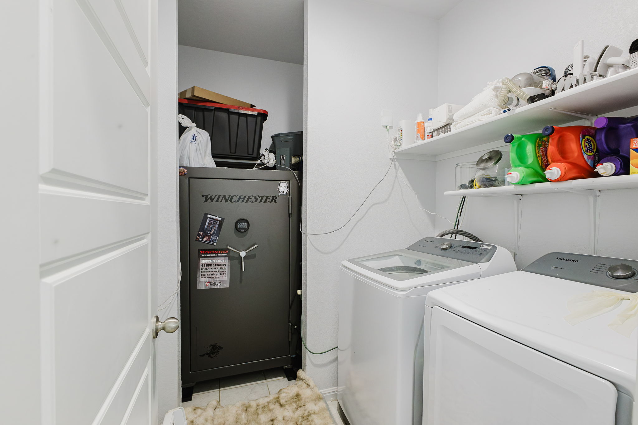 307 Watercourse Way Bastrop, TX 78602 - Photo 22 of 35 a utility room with dryer and washer