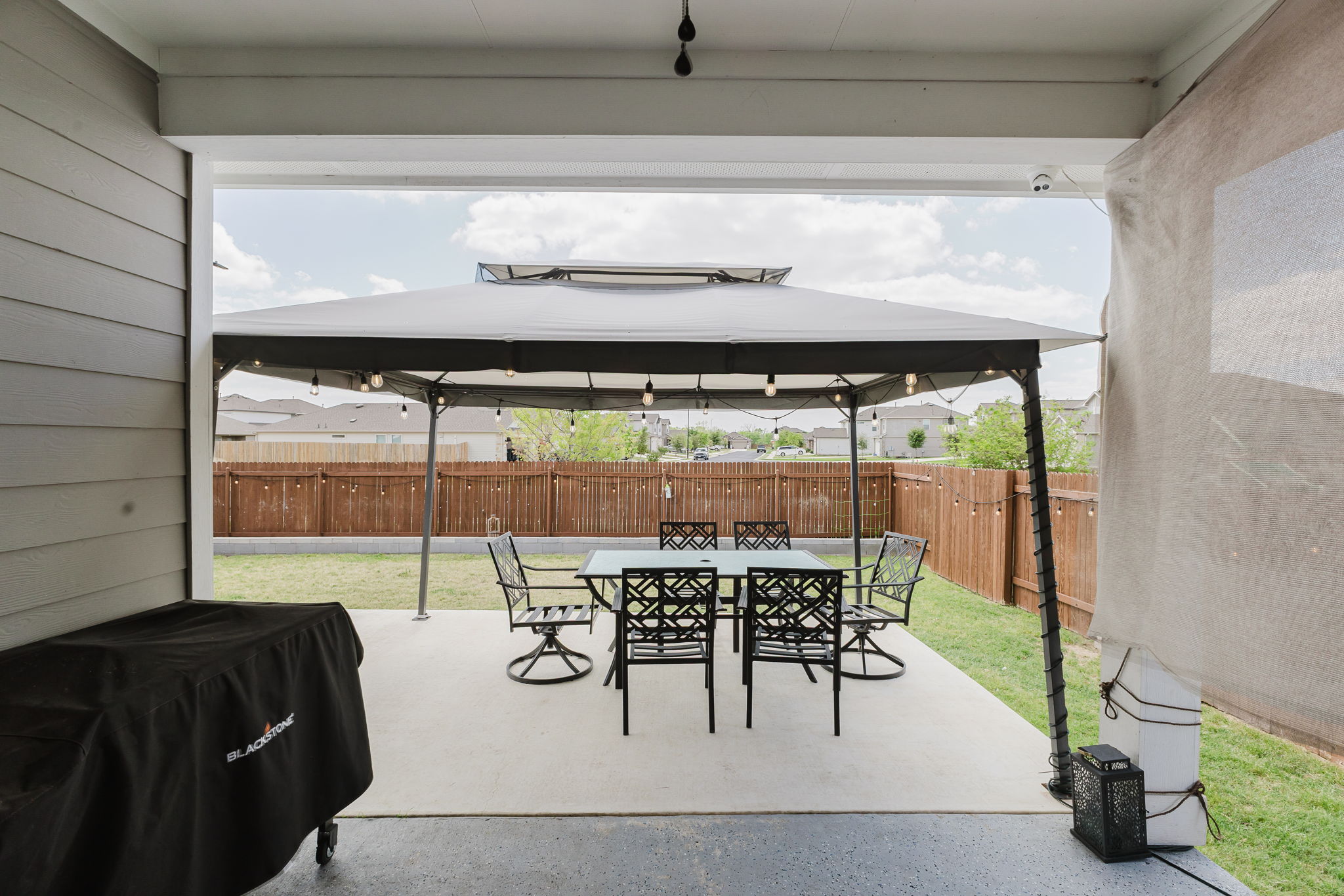 307 Watercourse Way Bastrop, TX 78602 - Photo 23 of 35 a view of a dining room with furniture window and outside view