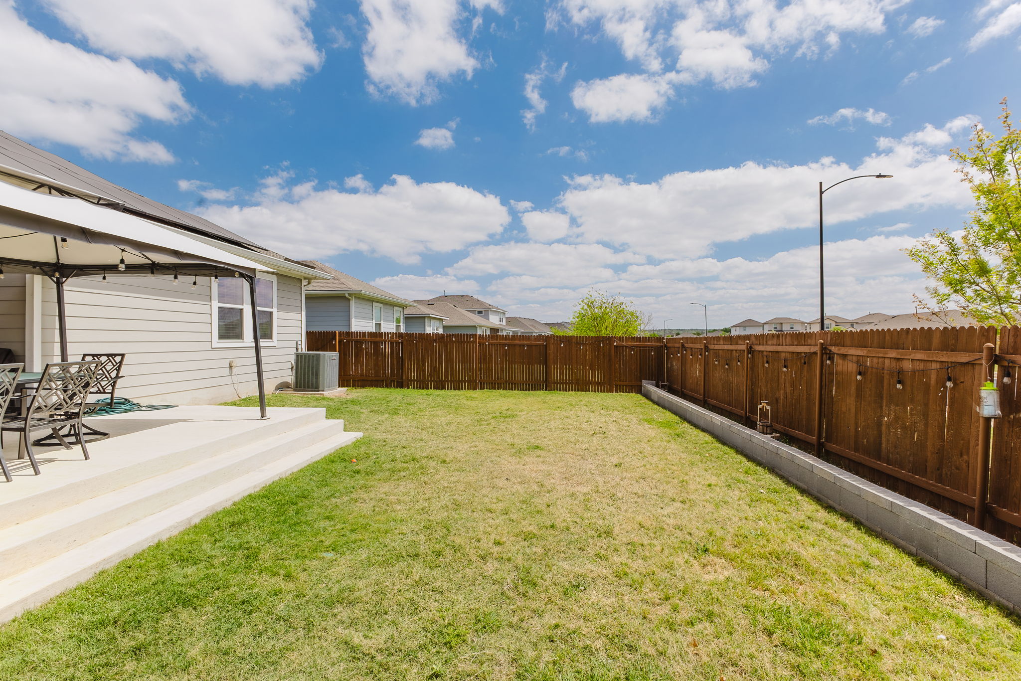 307 Watercourse Way Bastrop, TX 78602 - Photo 27 of 35 a view of a backyard