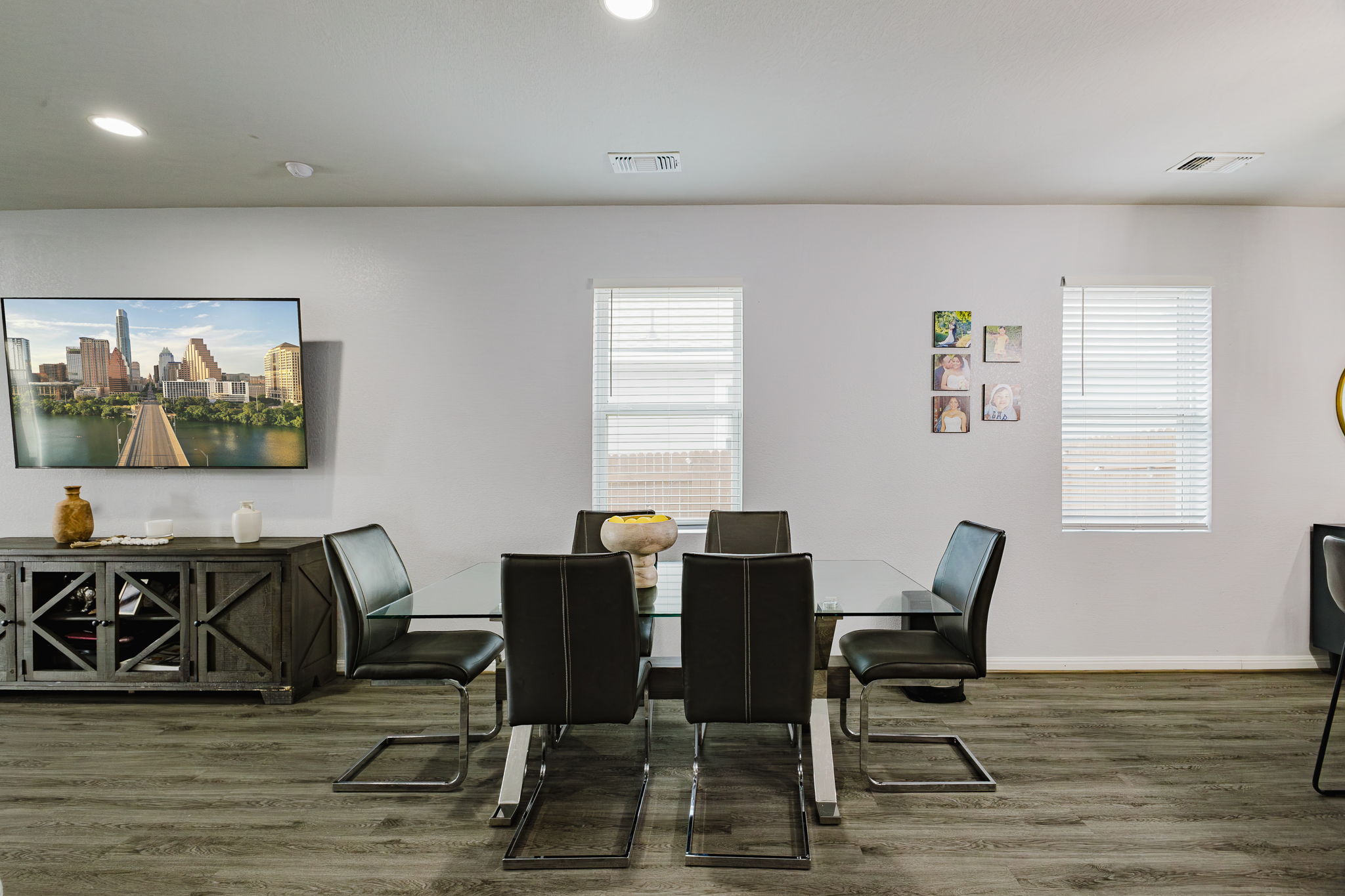 307 Watercourse Way Bastrop, TX 78602 - Photo 6 of 35 a view of a workspace with furniture and wooden floor