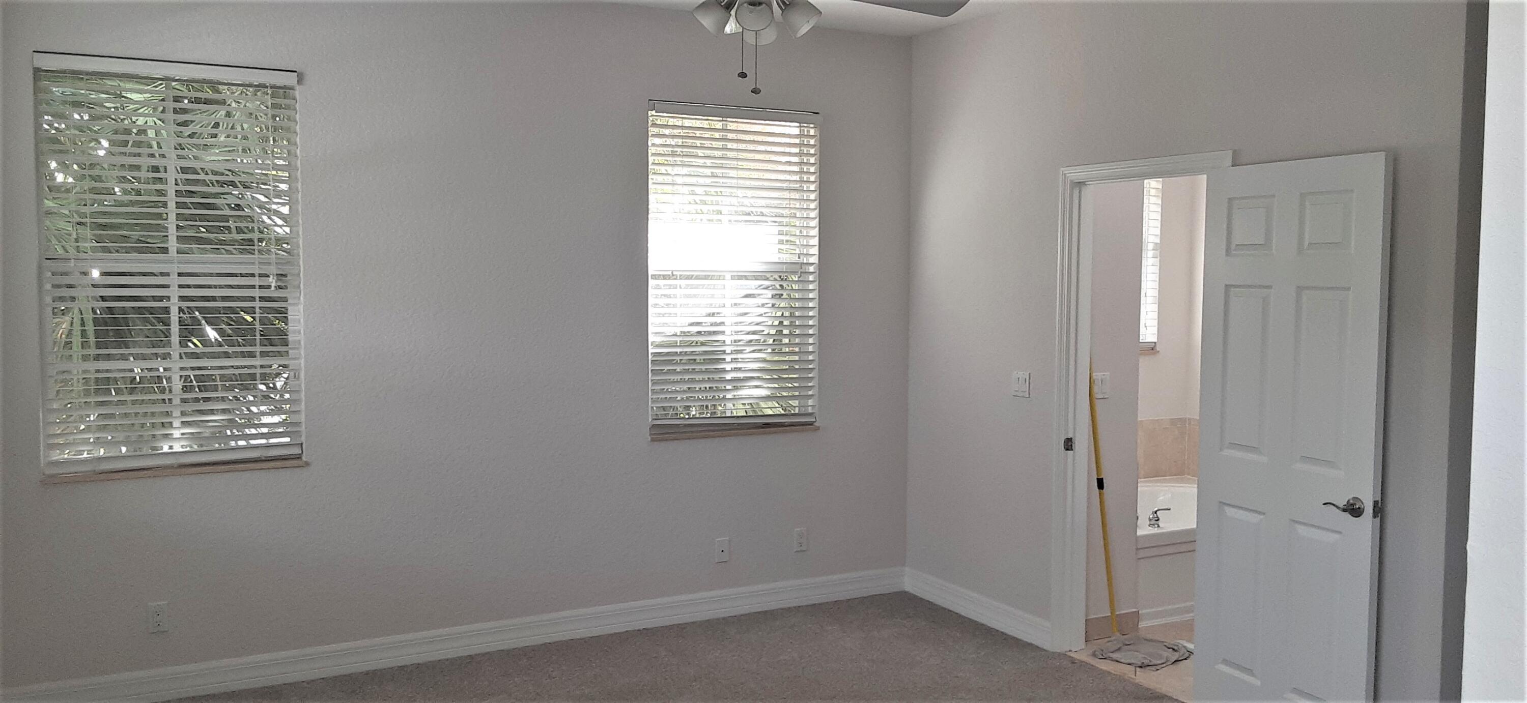 909 Northwest 18th Avenue Boca Raton, FL 33431 - Photo 15 of 39 a view of an empty room with a window