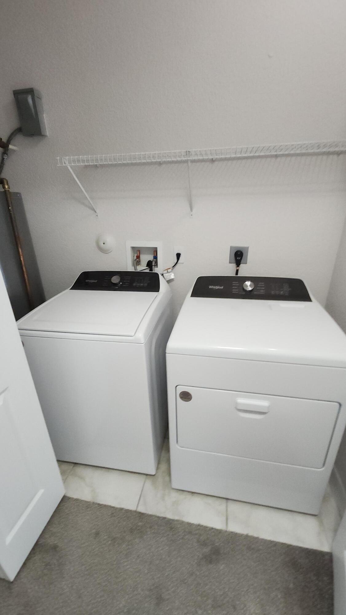 909 Northwest 18th Avenue Boca Raton, FL 33431 - Photo 20 of 39 a utility room with dryer and washer