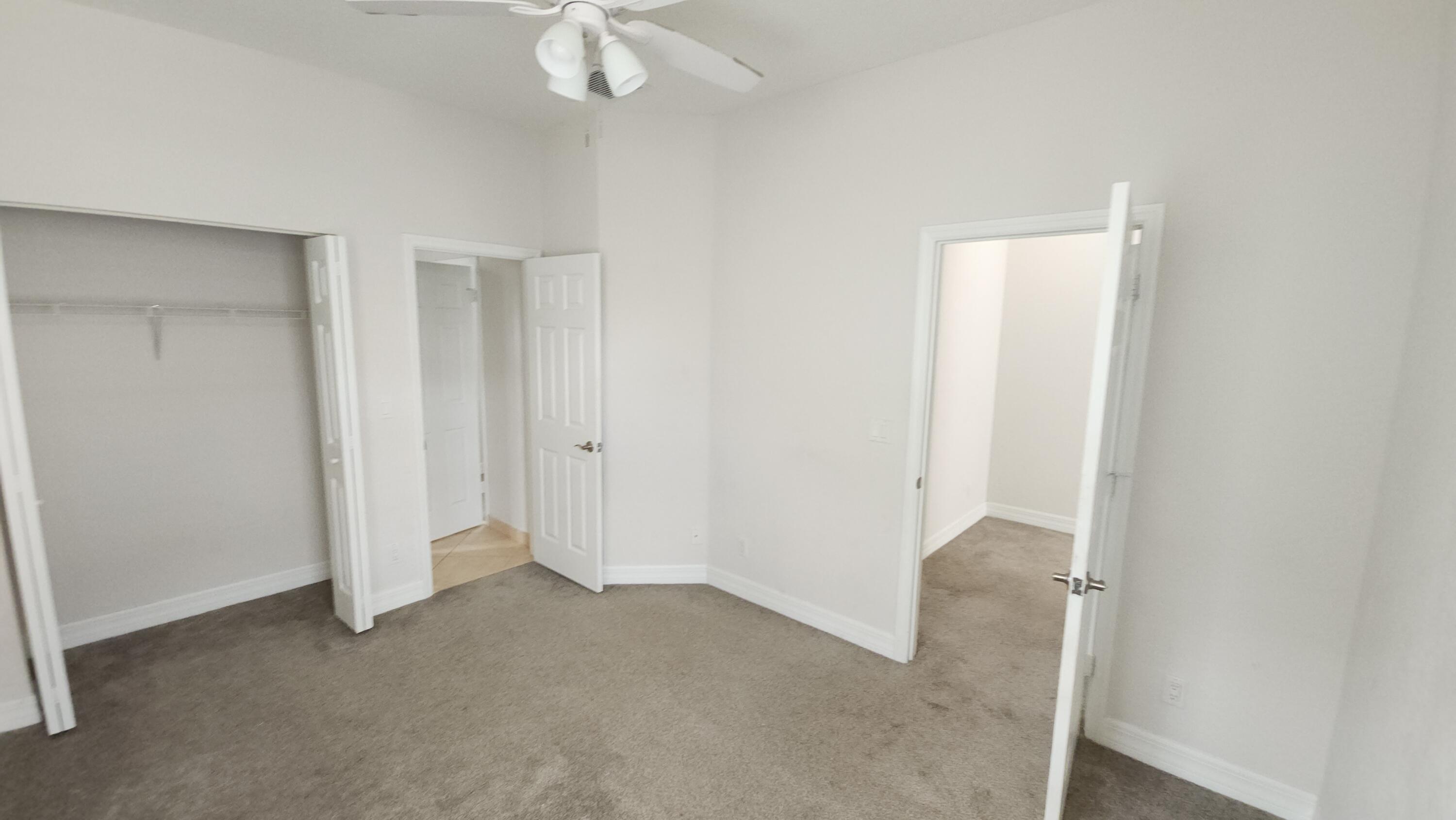 909 Northwest 18th Avenue Boca Raton, FL 33431 - Photo 23 of 39 an empty room with a bathroom