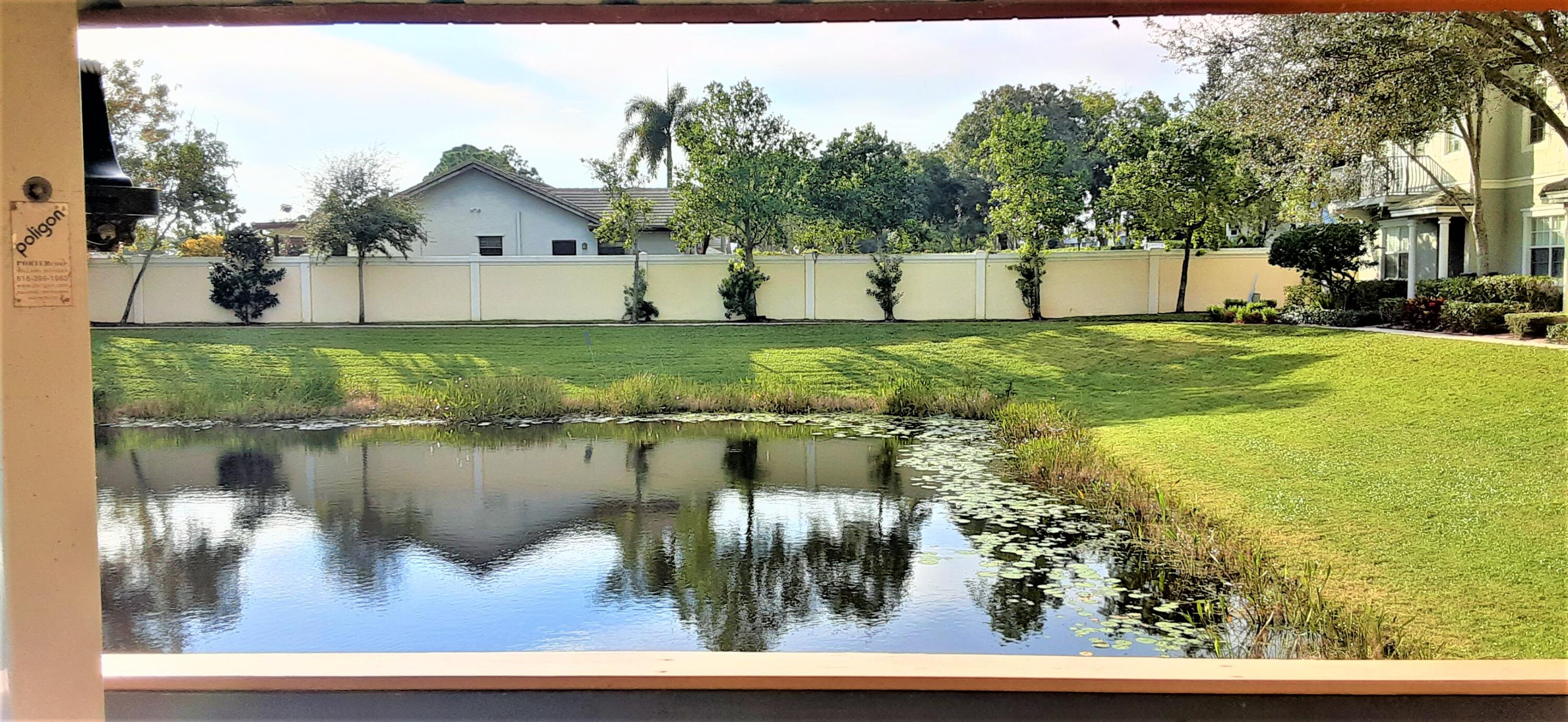 909 Northwest 18th Avenue Boca Raton, FL 33431 - Photo 38 of 39 a view of swimming pool from a window