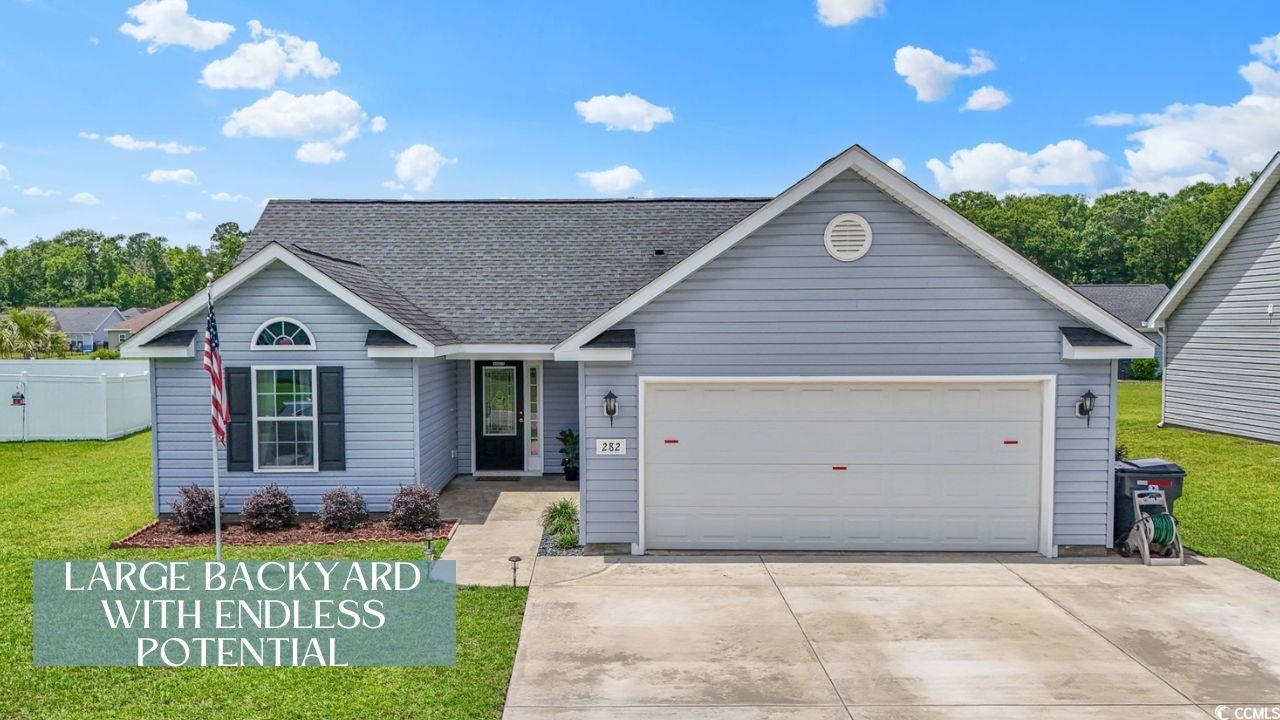 282 Foxpath Loop Myrtle Beach, SC 29588 - Photo 1 of 34 Single story home featuring concrete driveway, a garage, and roof with shingles