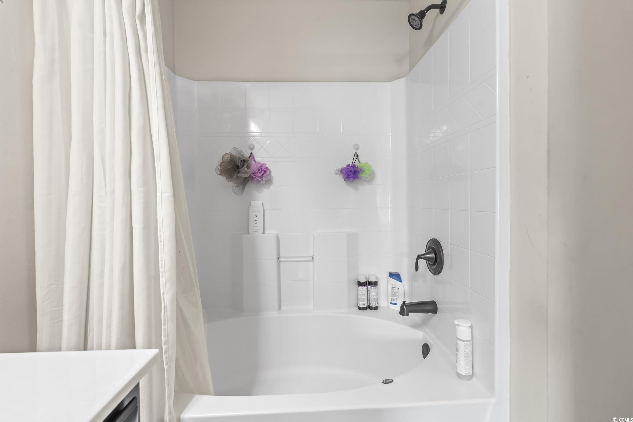 282 Foxpath Loop Myrtle Beach, SC 29588 - Photo 17 of 34 Full bath featuring shower / bathtub combination with curtain and vanity