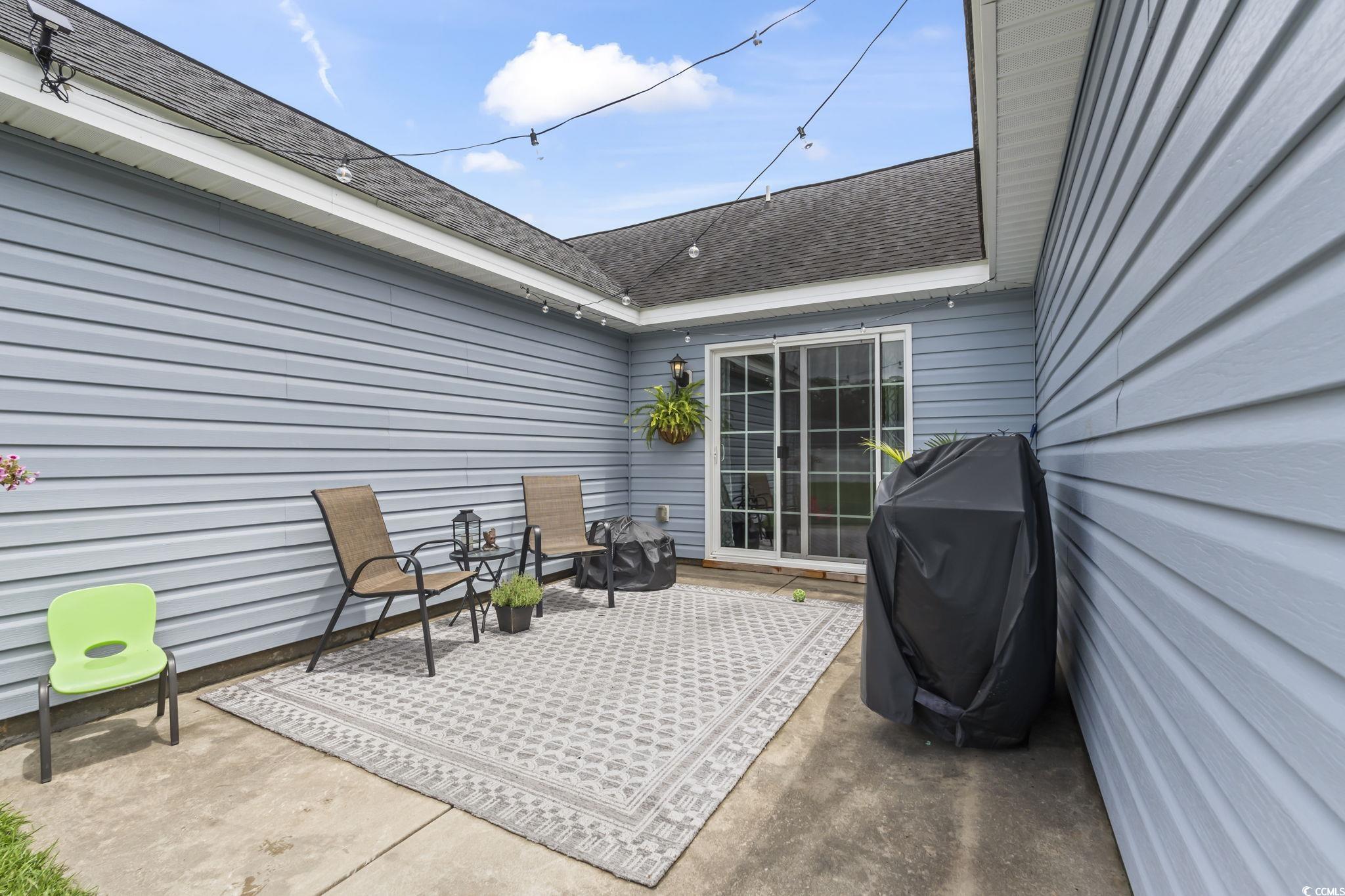 282 Foxpath Loop Myrtle Beach, SC 29588 - Photo 27 of 34 View of patio with area for grilling