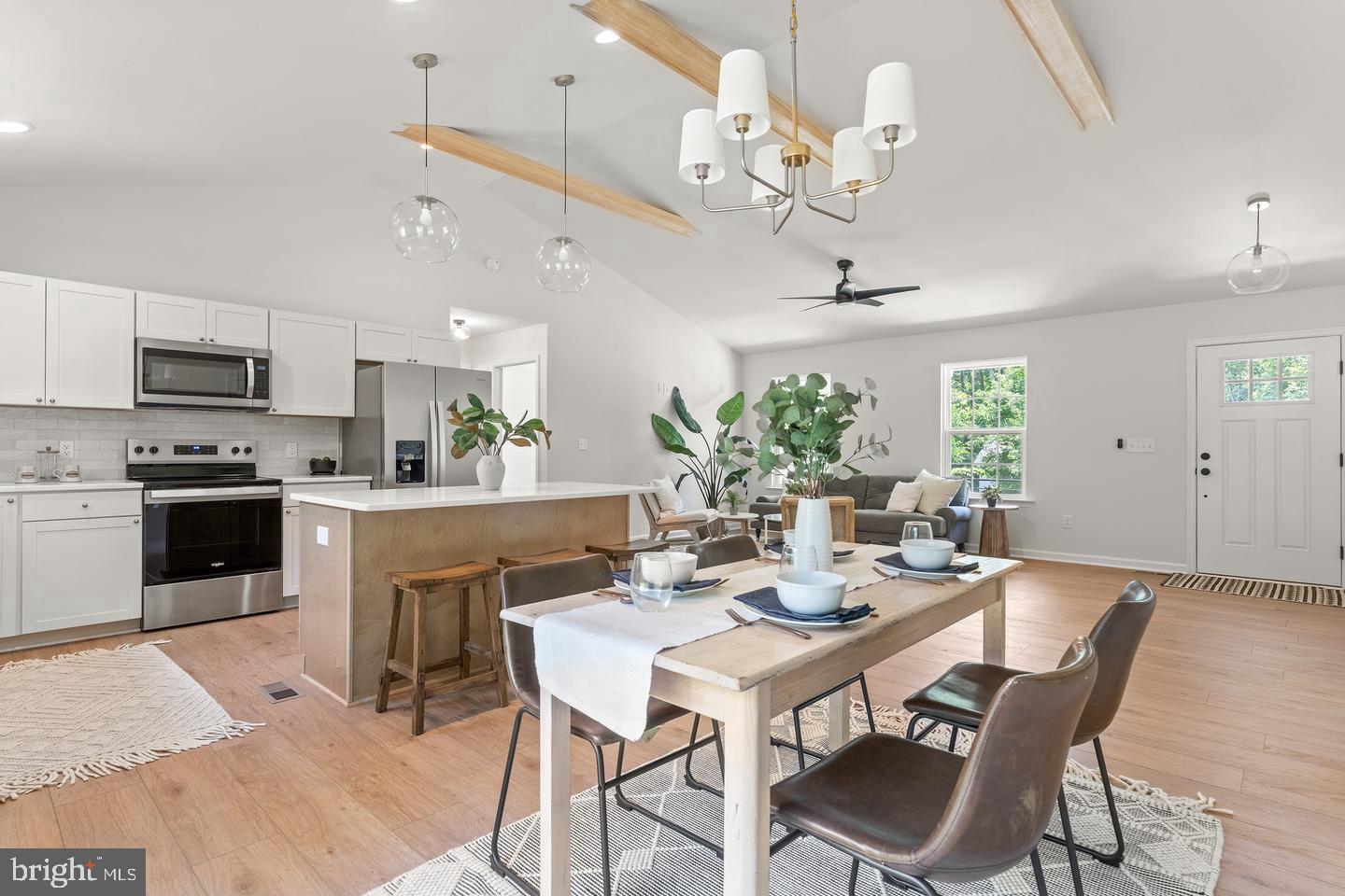 6150 Courthouse Road Spotsylvania, VA 22551 - Photo 5 of 39 Dining area w/table space, chandelier & more!