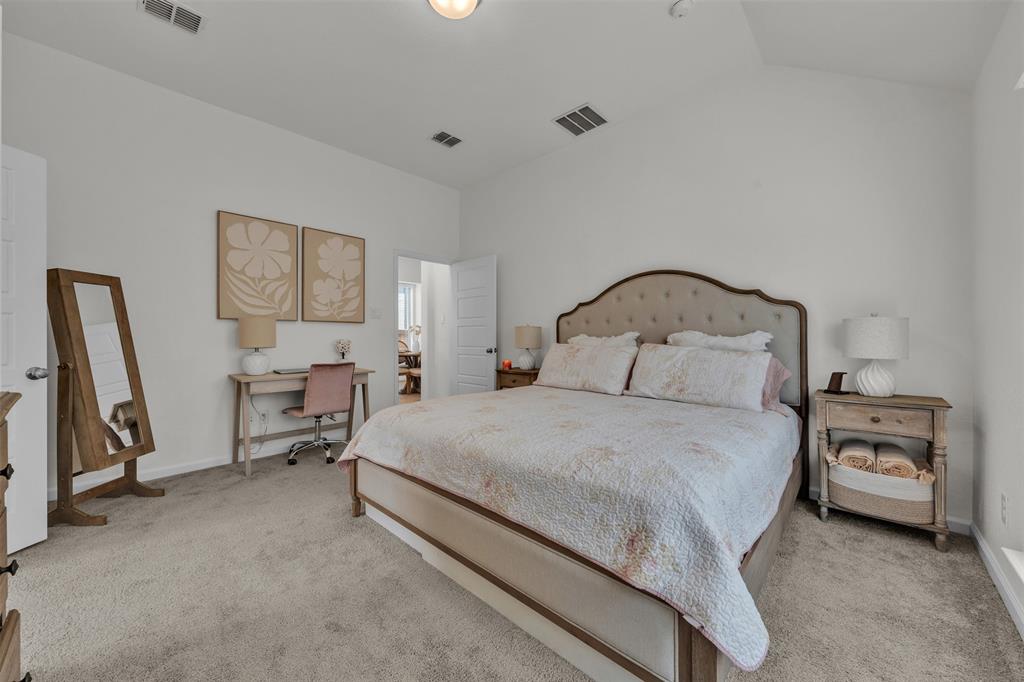 228 Palo Duro Bend Rhome, TX 76078 - Photo 16 of 35 a bedroom with a bed and a window