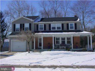 44 Champlain Road Marlton, NJ 08053 - Photo 1 of 6 a front view of a house with a garden