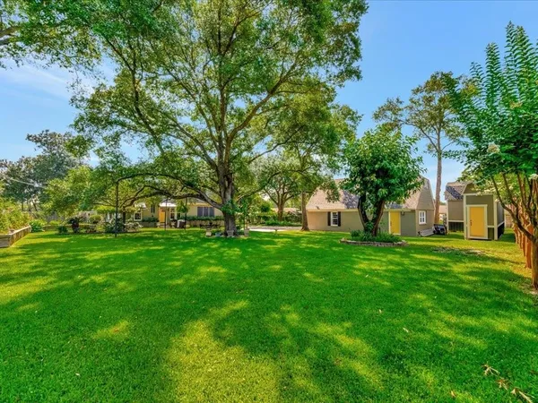 a view of a back yard of the house