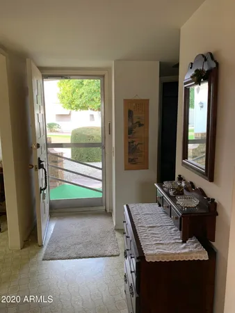 a room with furniture and a window
