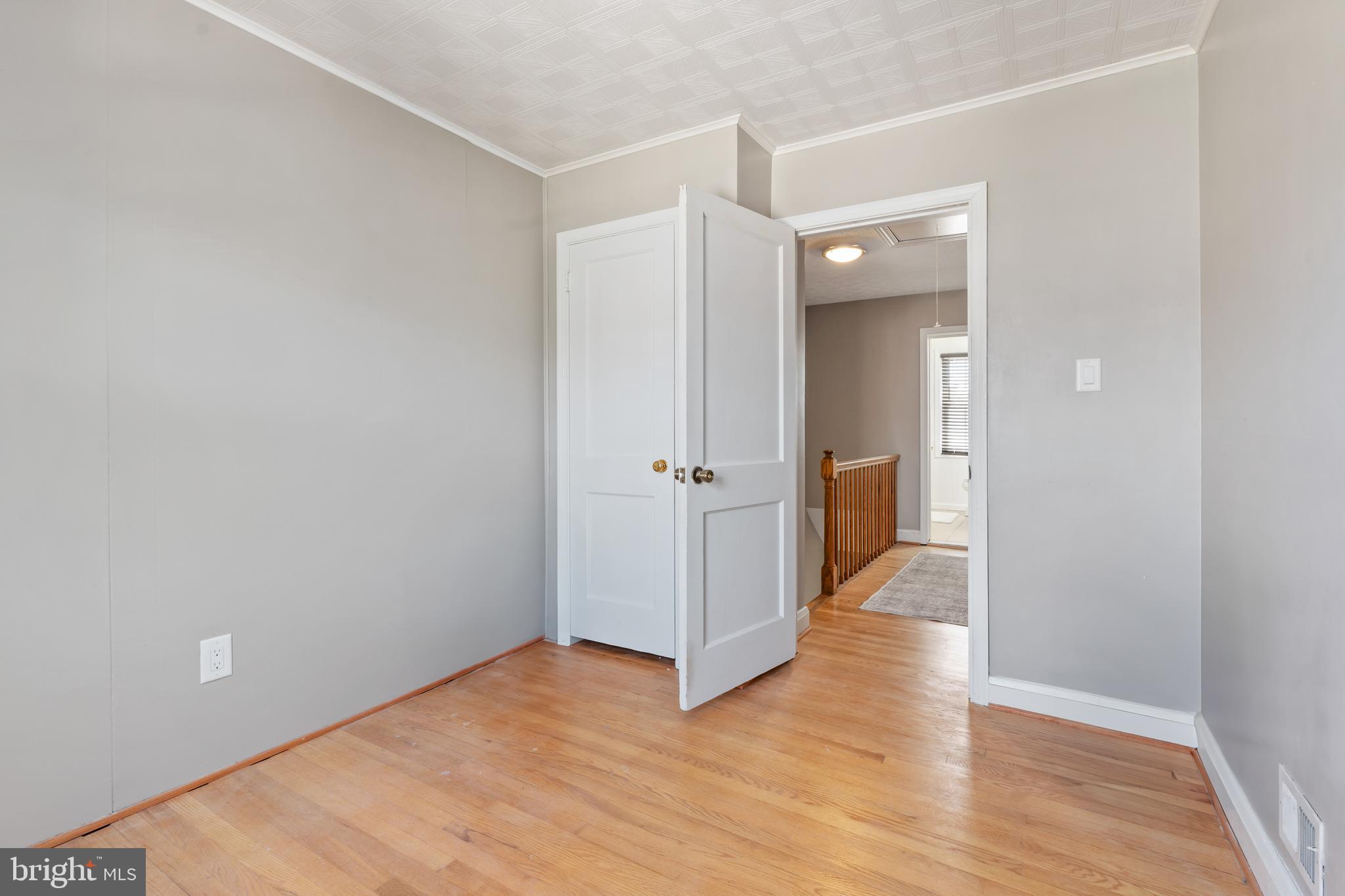 1518 Dellsway Road Towson, MD 21286 - Photo 23 of 34 a view of a hallway with wooden floor