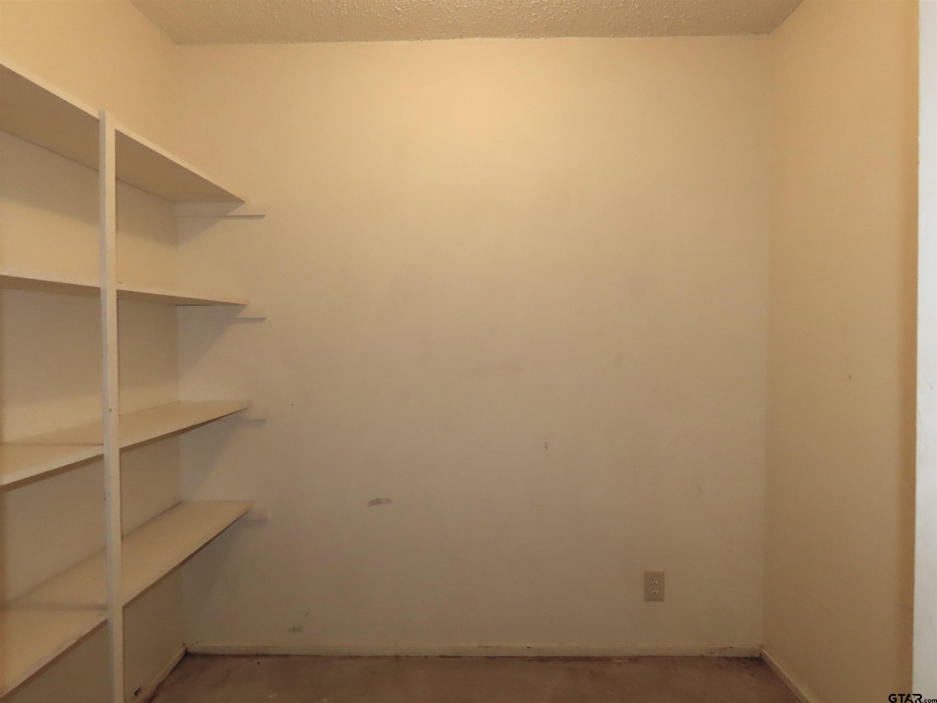 402 Muller Garden Road Tyler, TX 75703 - Photo 30 of 33 a view of a room with empty racks