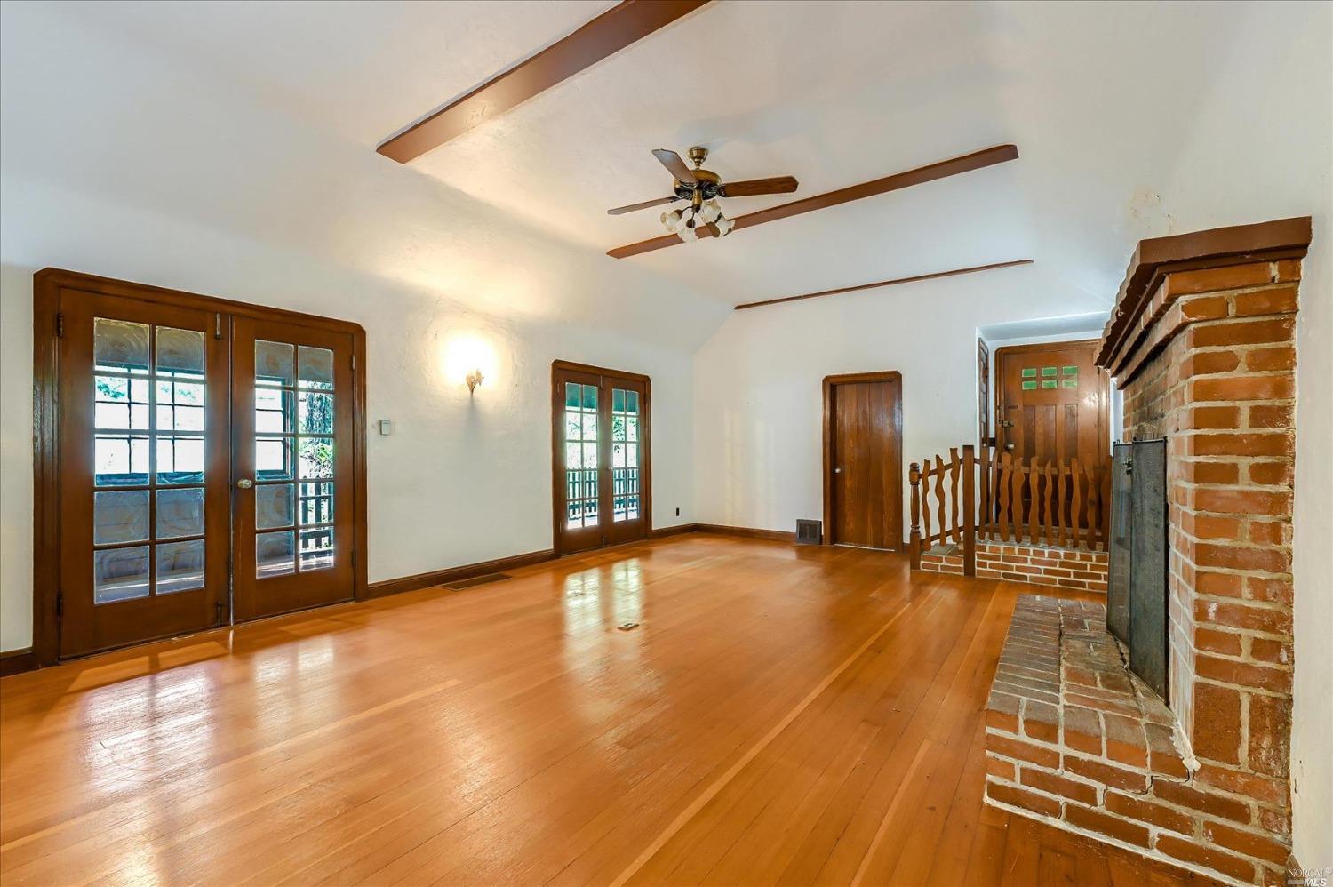 12 Jones Way Larkspur, CA 94939 - Photo 1 of 1 a view of empty room with wooden floor and fan