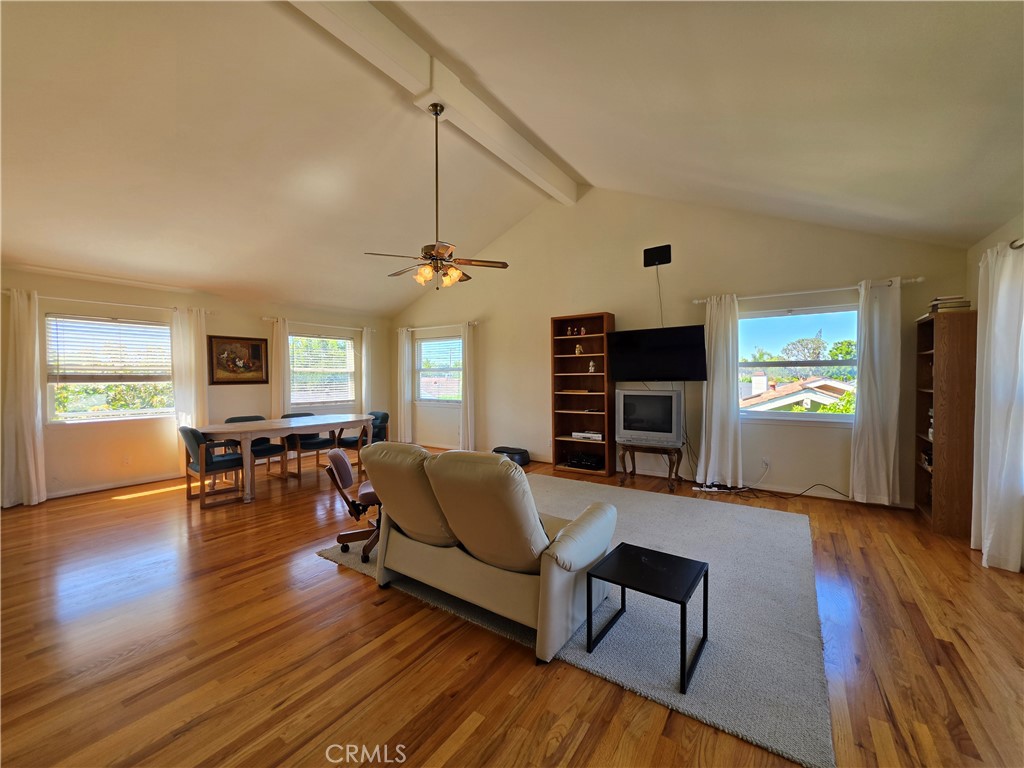 11541 Donovan Road Rossmoor, CA 90720 - Photo 31 of 51 Upstairs vaulted loft/bonus room with hardwood floors