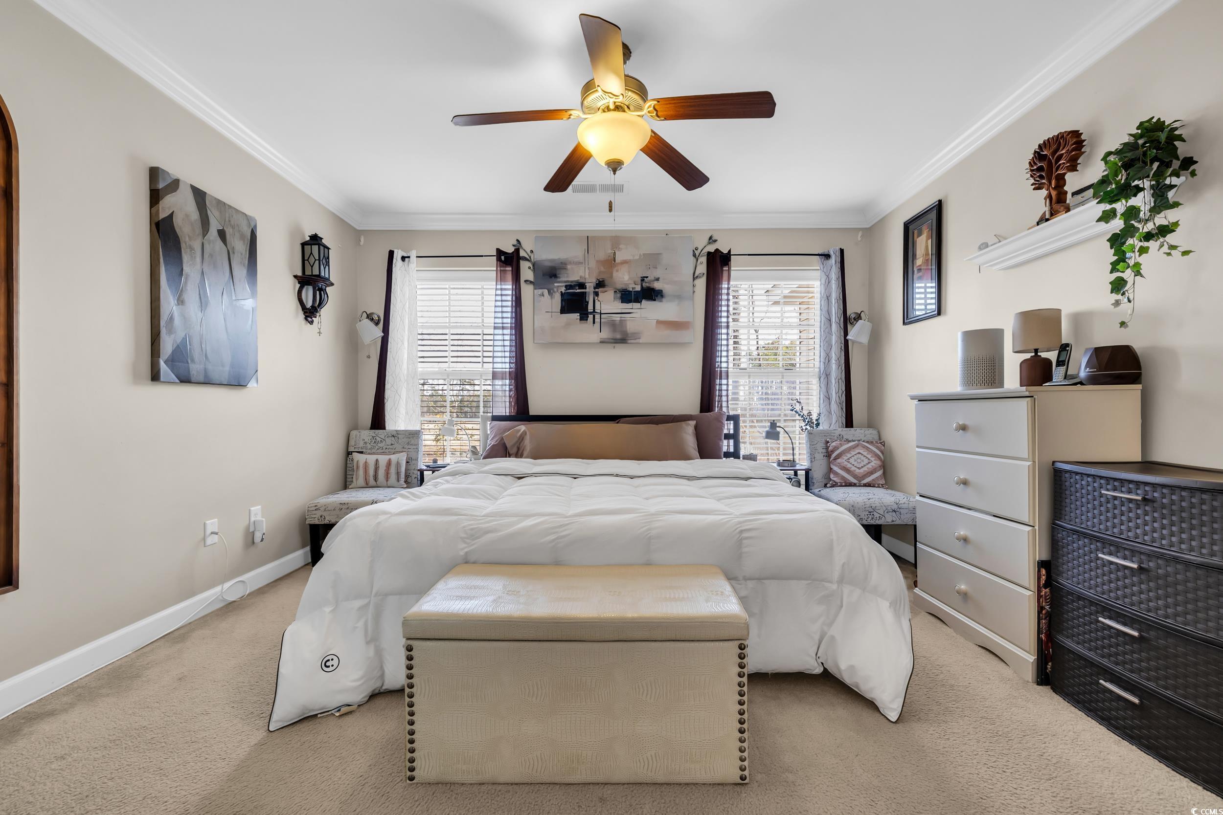 1040 Fairway Lane, Unit 1040 Conway, SC 29526 - Photo 14 of 28 Bedroom with ornamental molding, light carpet, and ceiling fan