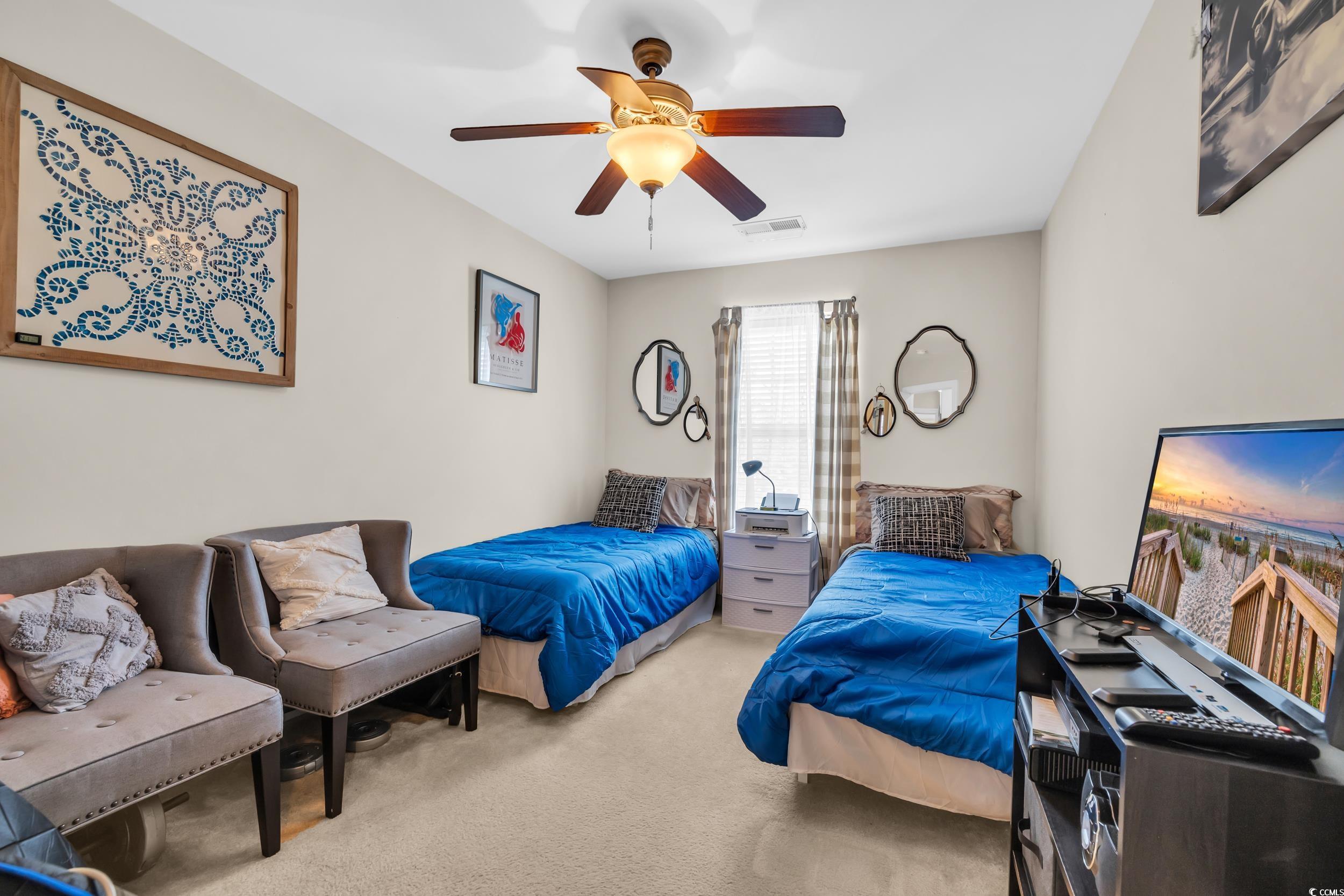 1040 Fairway Lane, Unit 1040 Conway, SC 29526 - Photo 21 of 28 Carpeted bedroom featuring ceiling fan