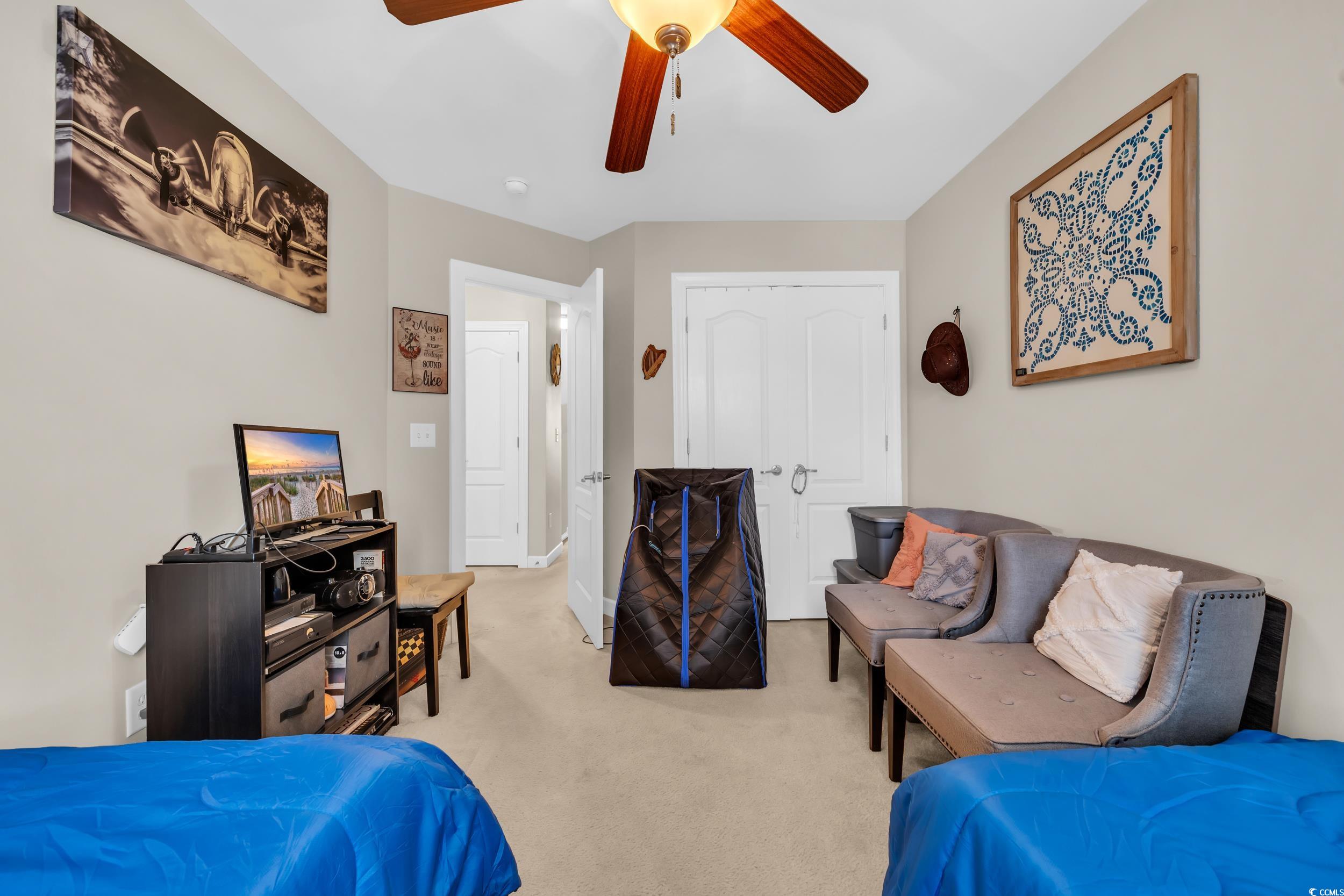 1040 Fairway Lane, Unit 1040 Conway, SC 29526 - Photo 22 of 28 Carpeted bedroom with ceiling fan
