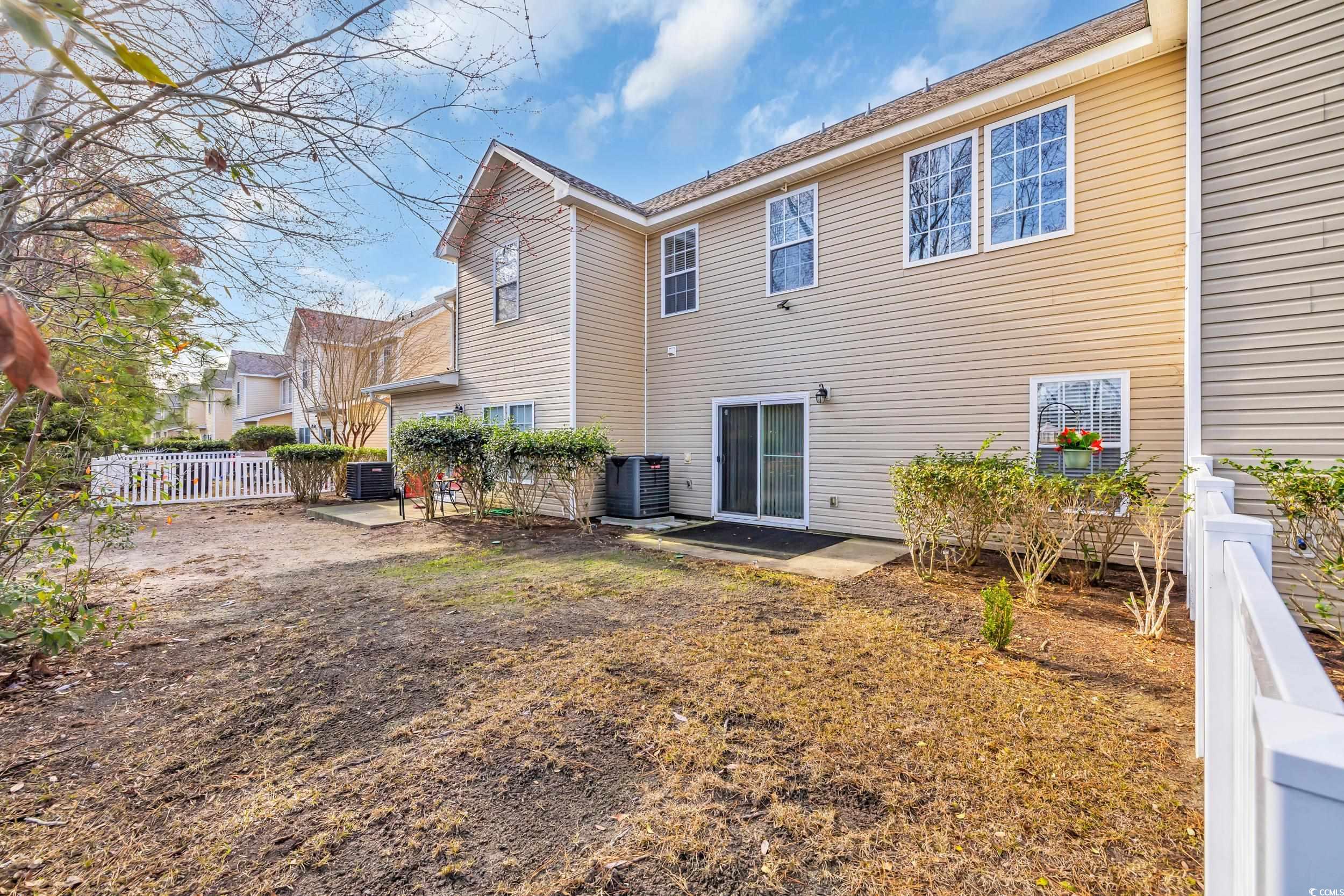 1040 Fairway Lane, Unit 1040 Conway, SC 29526 - Photo 23 of 28 Back of house featuring central AC and a patio area