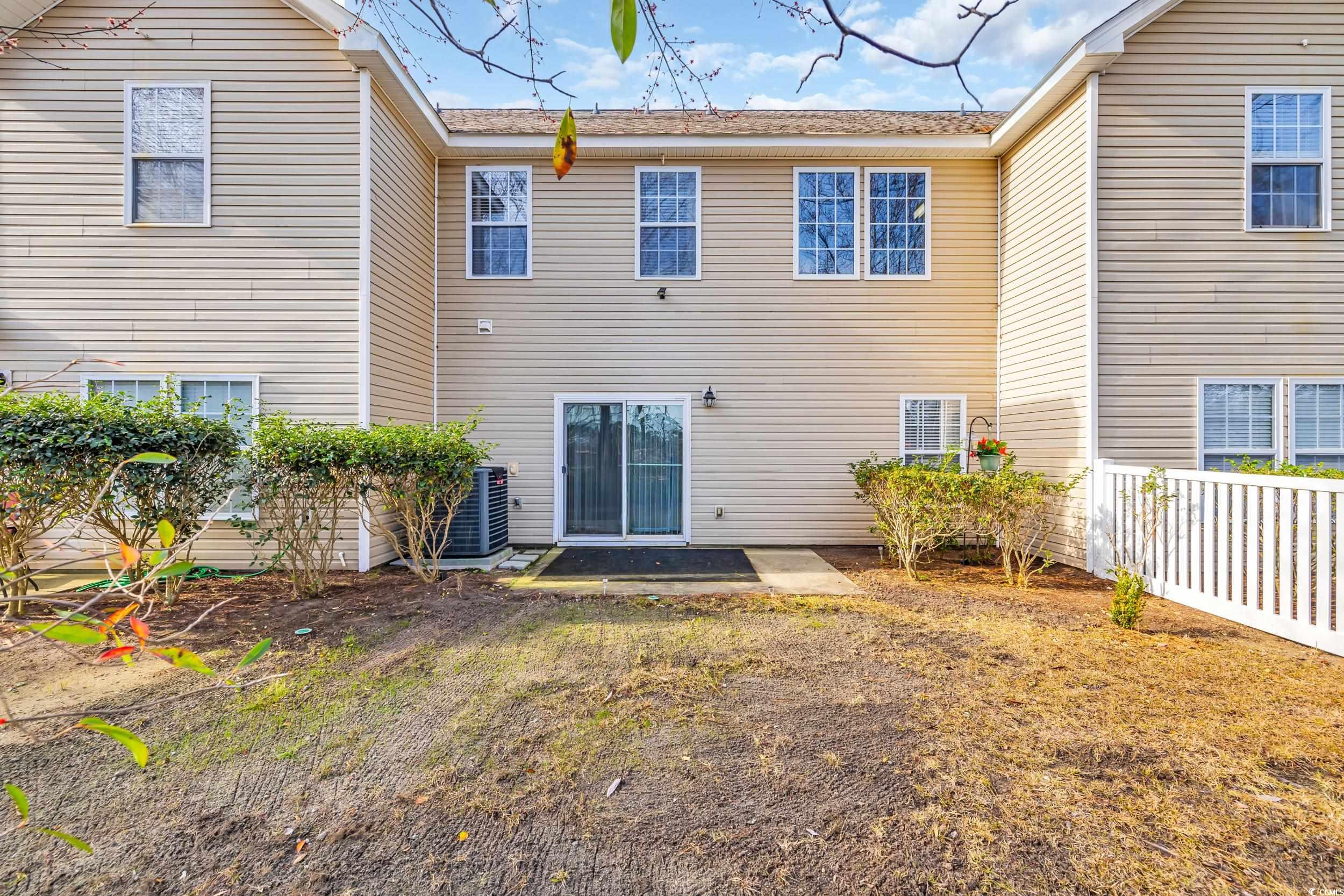 1040 Fairway Lane, Unit 1040 Conway, SC 29526 - Photo 24 of 28 Rear view of property with central air condition unit