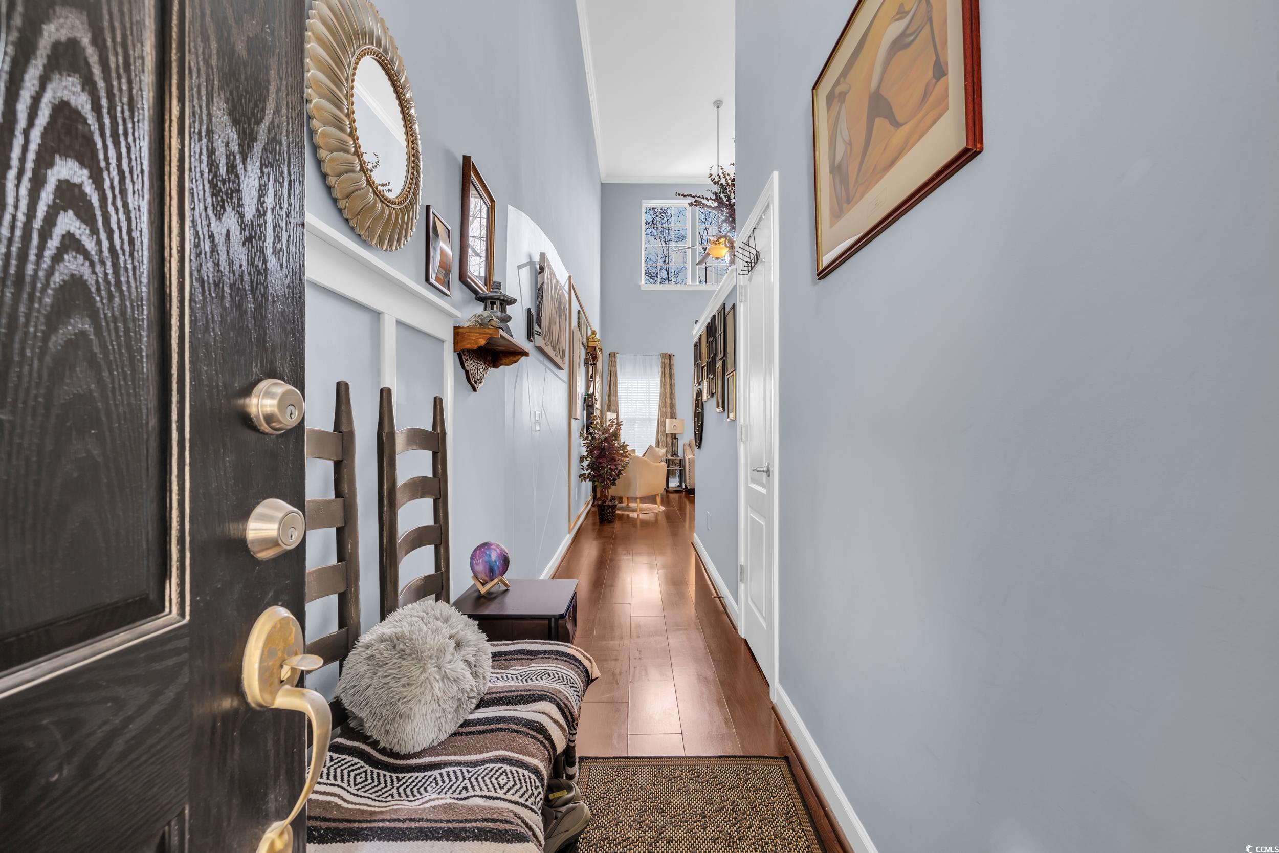 1040 Fairway Lane, Unit 1040 Conway, SC 29526 - Photo 3 of 28 Corridor with a towering ceiling and dark hardwood / wood-style floors