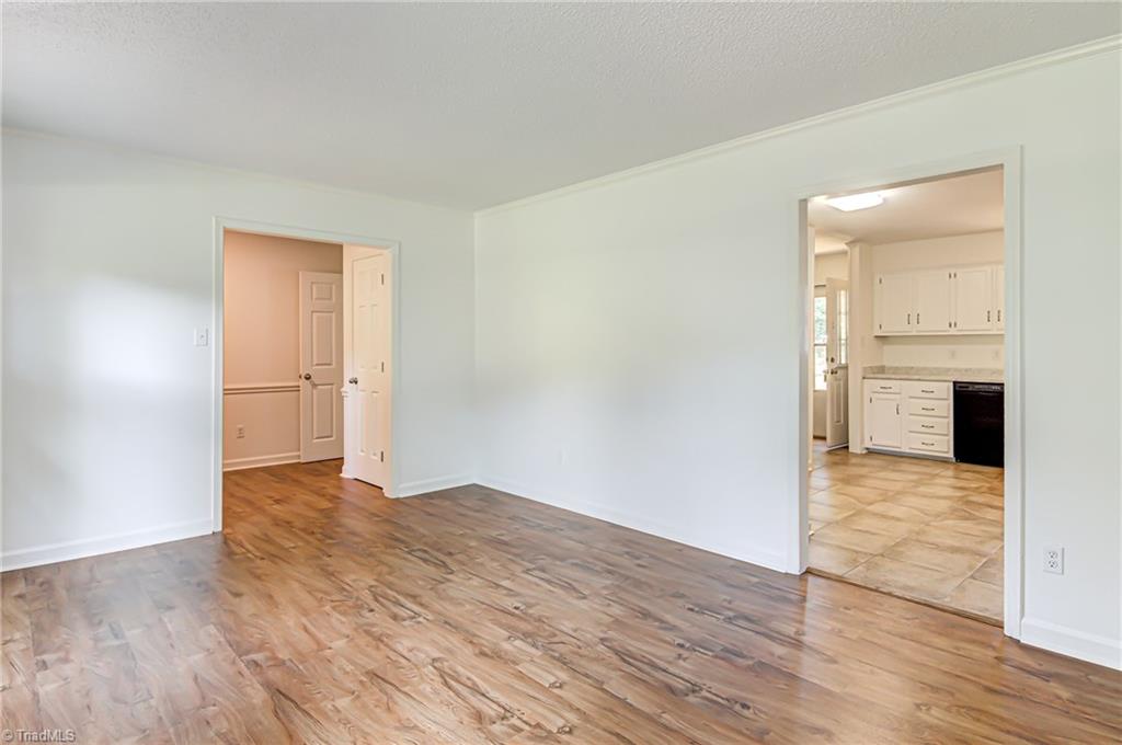 325 Old Mill Road High Point, NC 27265 - Photo 8 of 26 Living room view of entryway and kitchen