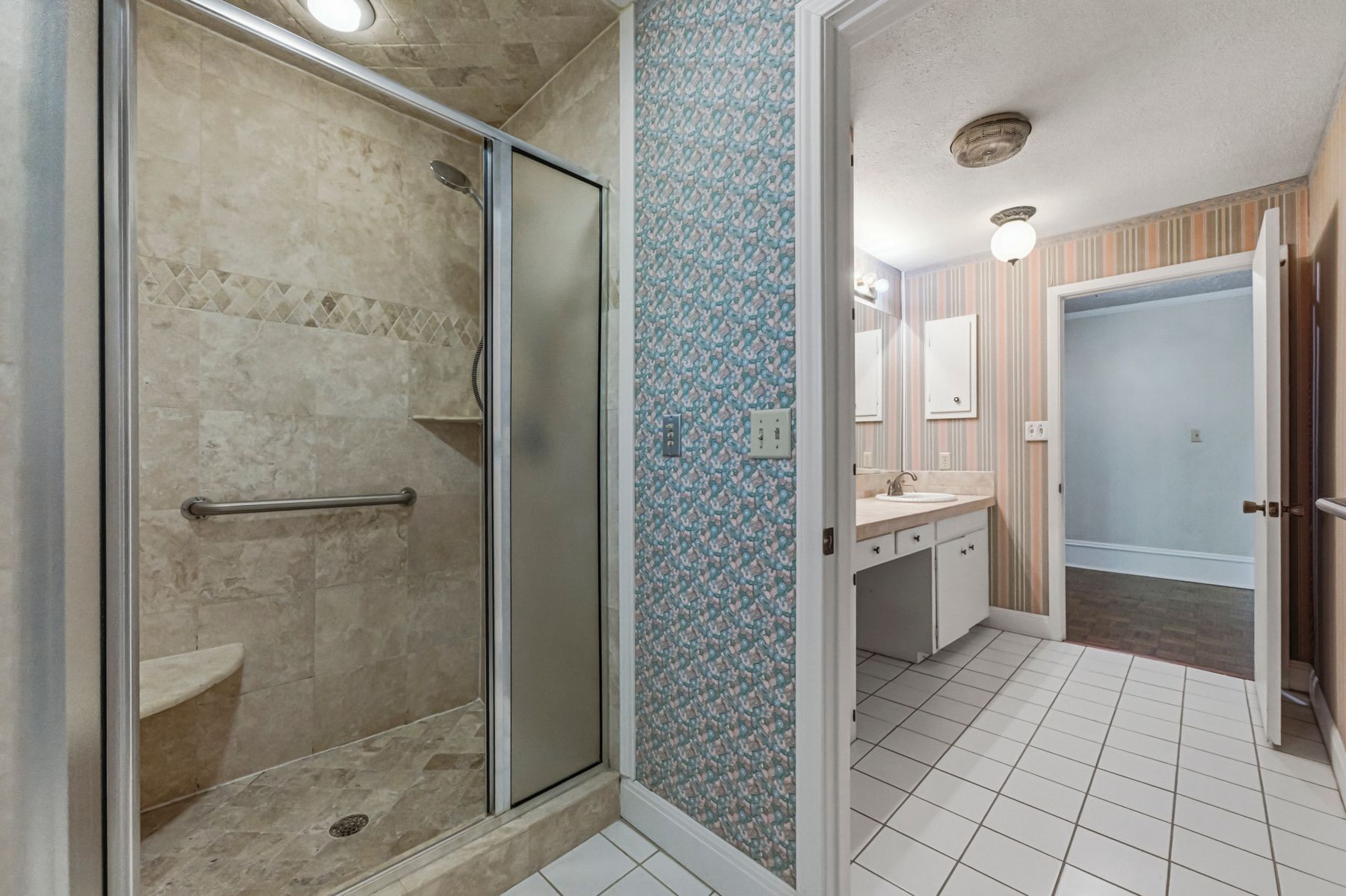 100 West 11th Street Elgin, TX 78621 - Photo 20 of 32 a bathroom with a shower and a sink