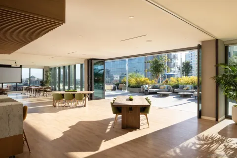 a view of a dining room with furniture window and outside view