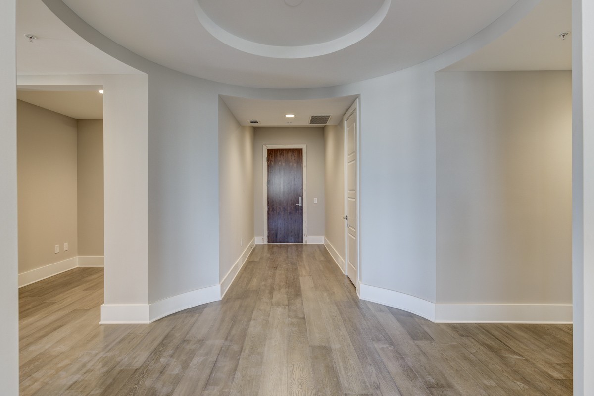 20 Rutledge Street, Unit 601 Nashville, TN 37210 - Photo 7 of 30 a view of a hallway with wooden floor