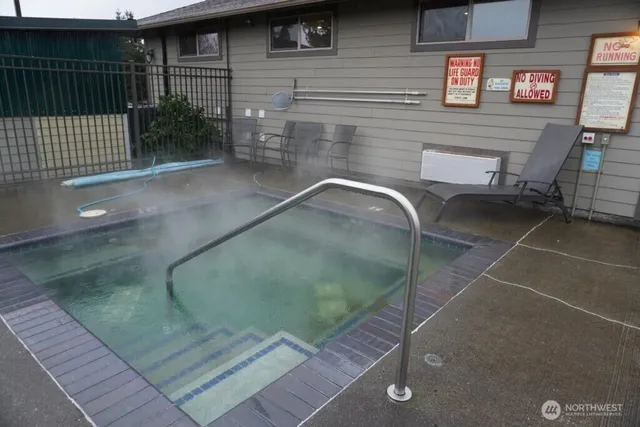 a backyard of a house with seating space