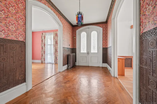 a view of entryway with chandelier