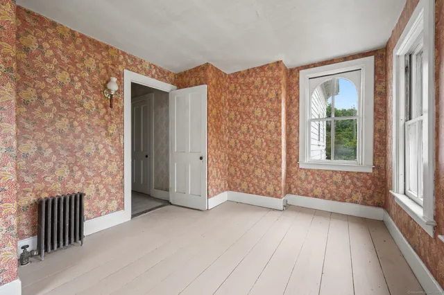 an empty room with windows