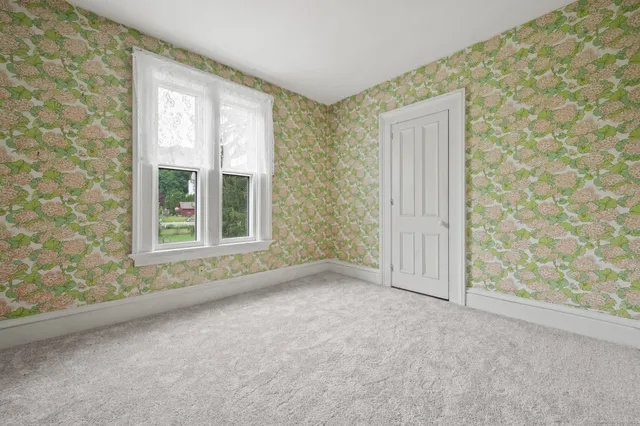 an empty room with windows