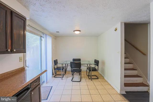 a room with furniture and wooden floor