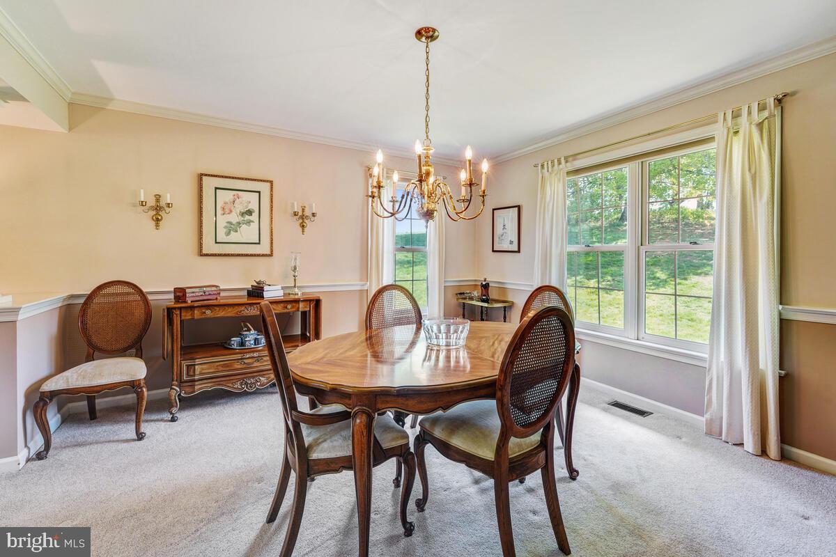 618 Aberdeen Road Kennett Square, PA 19348 - Photo 7 of 36 Formal Dining Room with Crown Molding