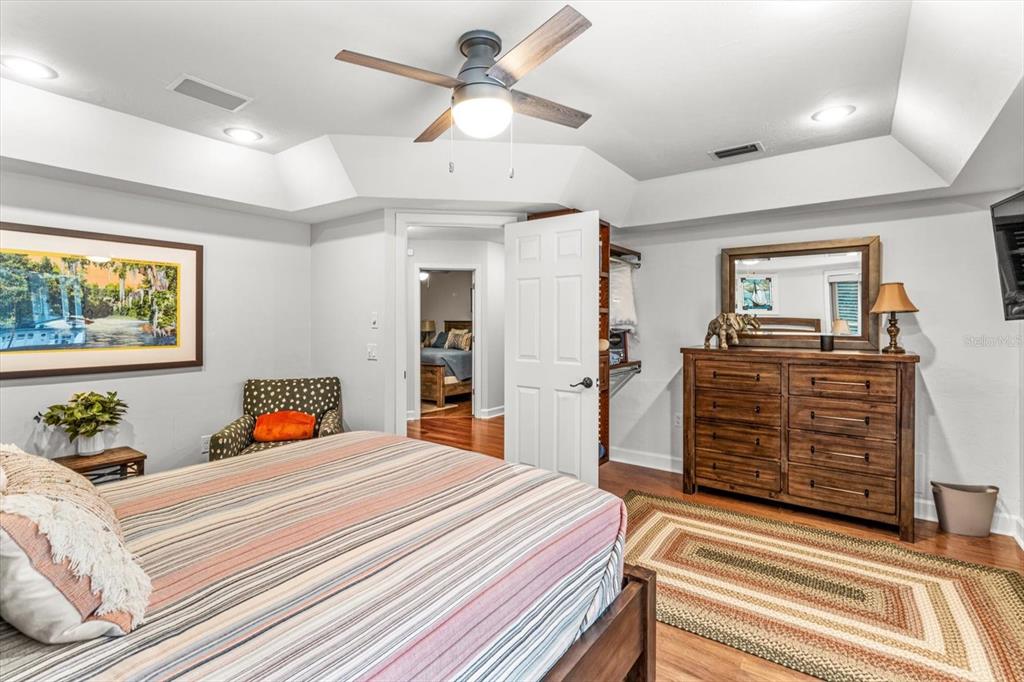 20 Captains Cove Road Inglis, FL 34449 - Photo 34 of 94 a bedroom with a bed and dresser