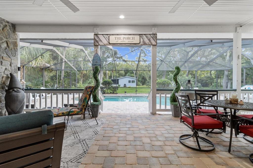 20 Captains Cove Road Inglis, FL 34449 - Photo 47 of 94 a view of a porch with furniture and wooden deck