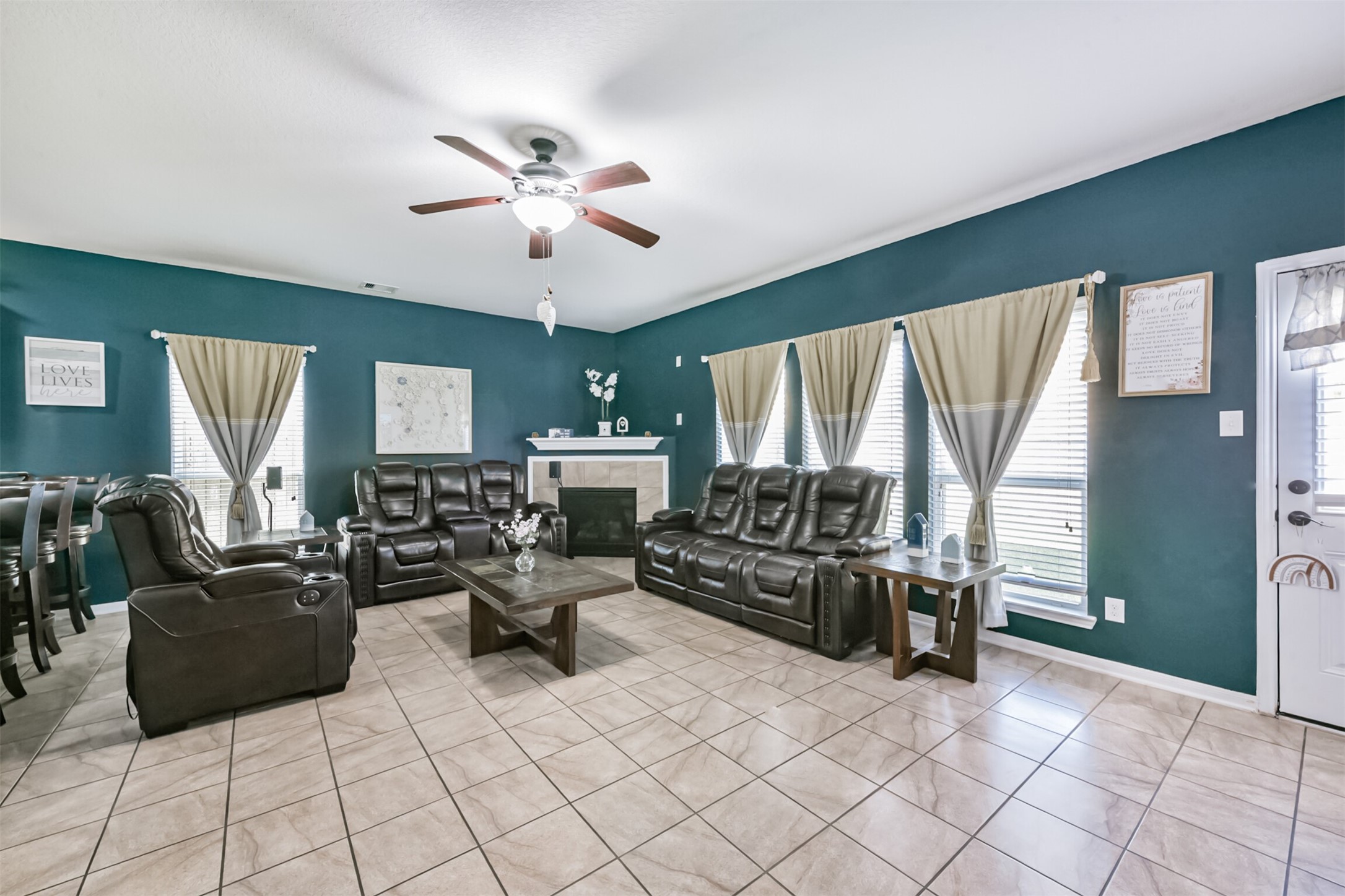 14723 Nickel Plank Road Houston, TX 77049 - Photo 16 of 47 a living room with furniture and a large window