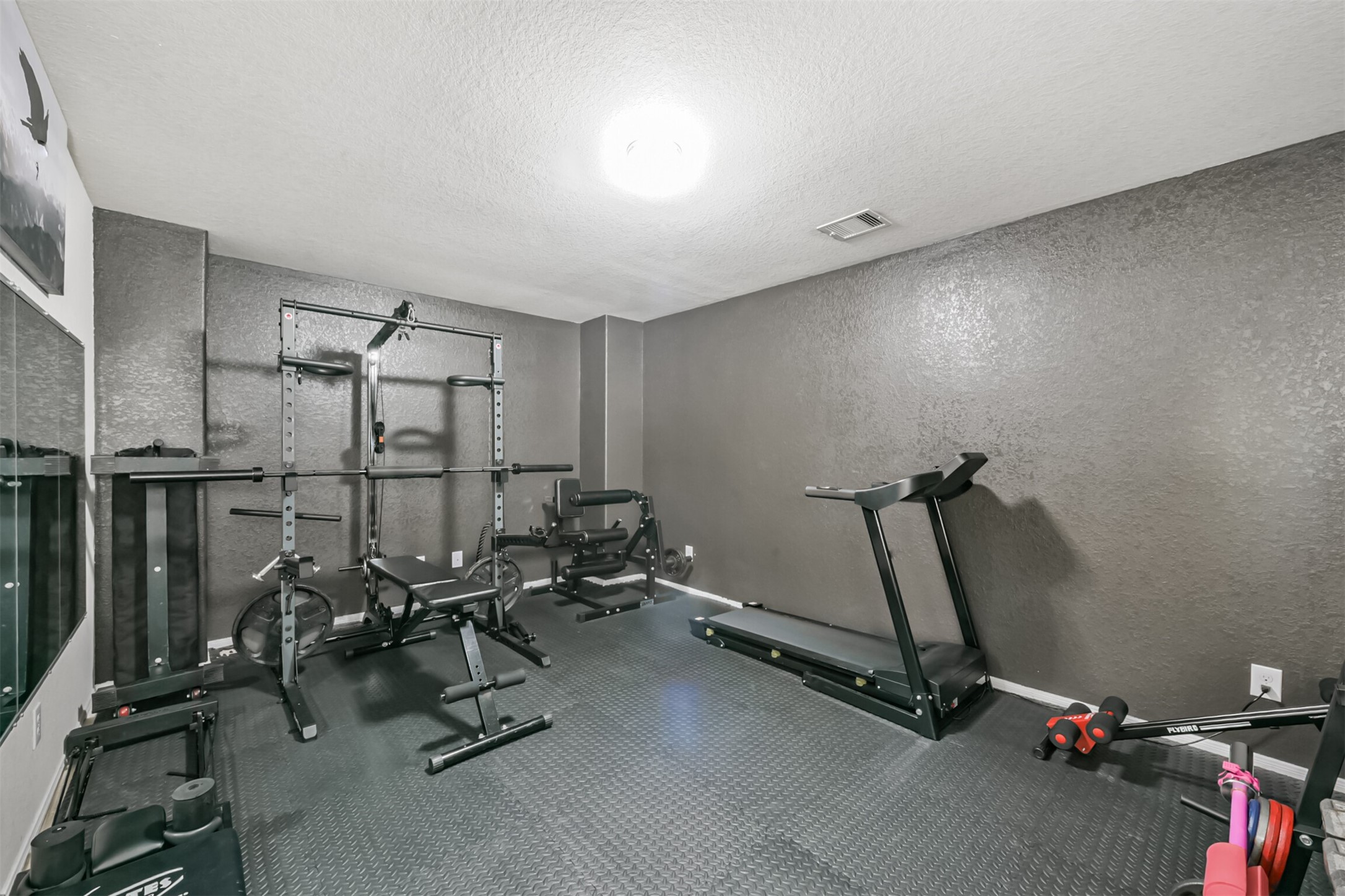 14723 Nickel Plank Road Houston, TX 77049 - Photo 29 of 47 a room with gym equipment