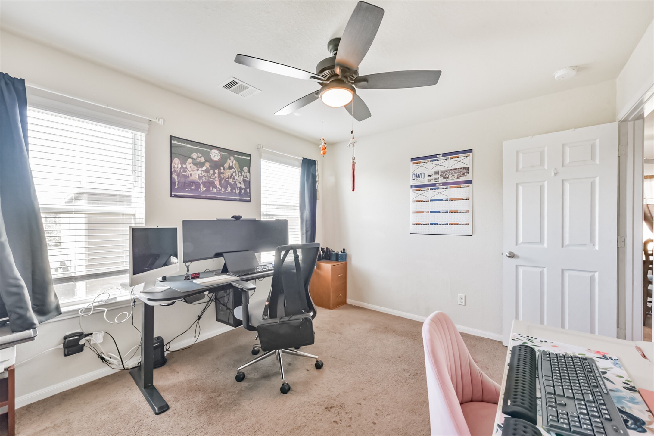 14723 Nickel Plank Road Houston, TX 77049 - Photo 32 of 47 a view of a workspace with furniture and a window