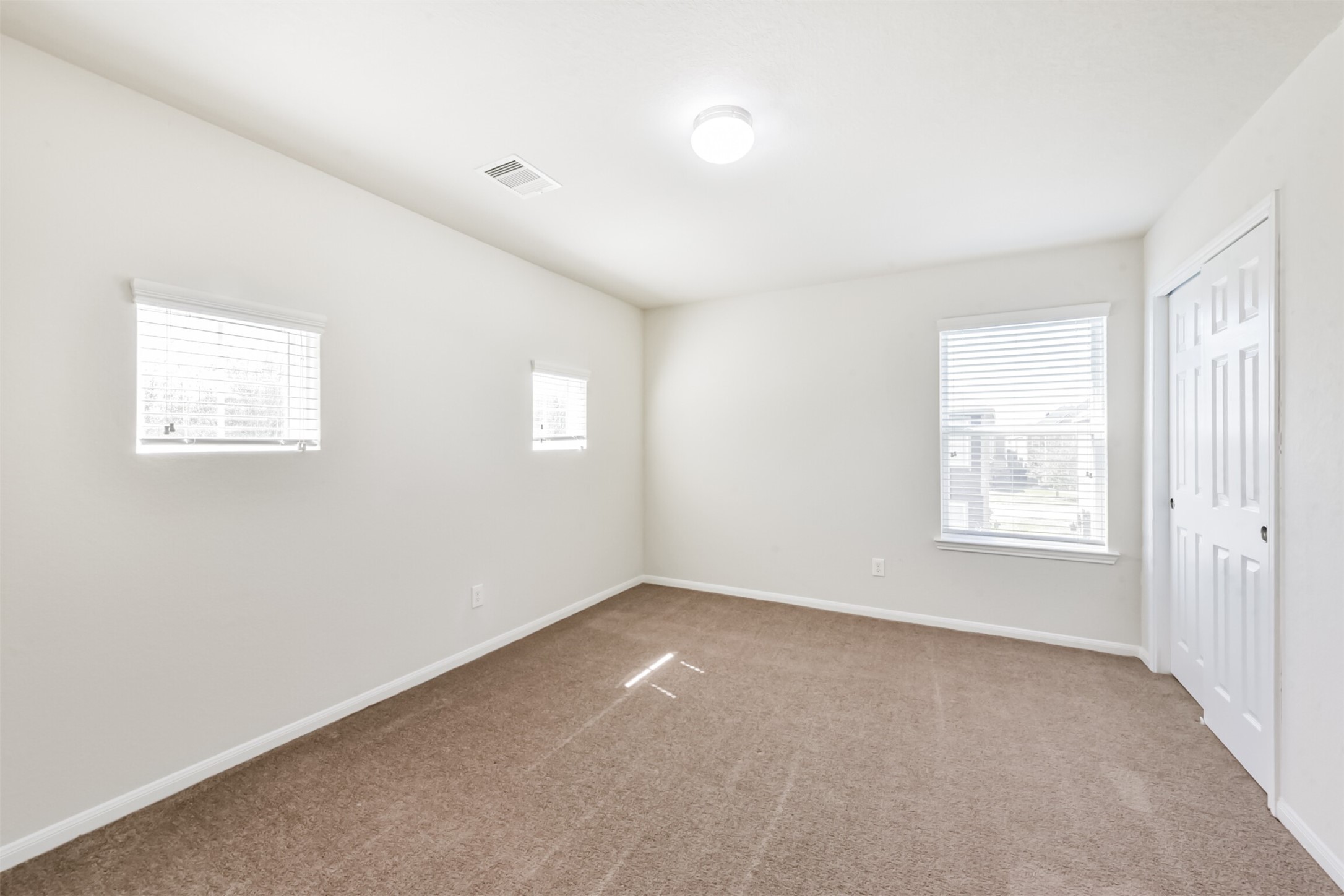 14723 Nickel Plank Road Houston, TX 77049 - Photo 33 of 47 a view of an empty room with a window