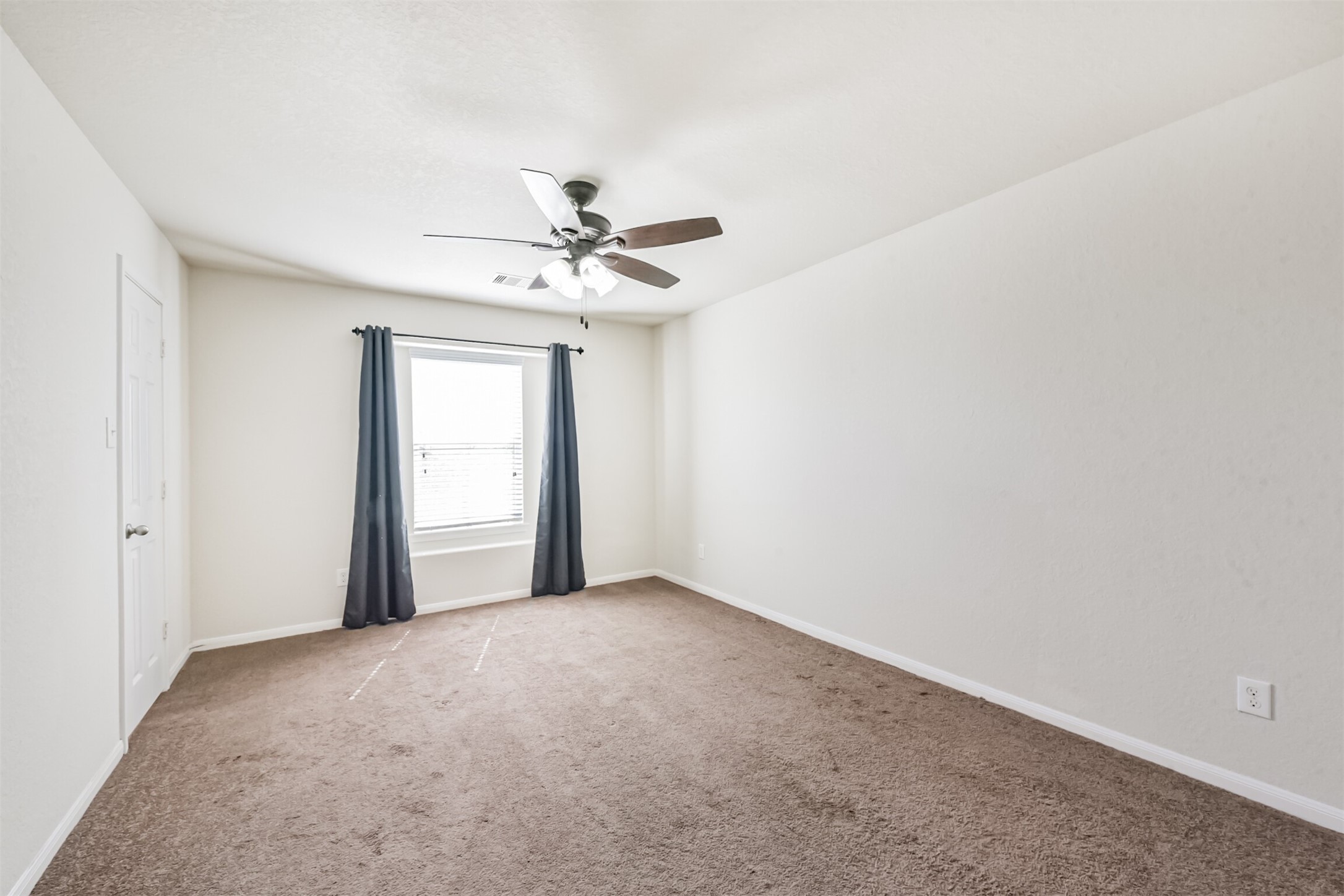 14723 Nickel Plank Road Houston, TX 77049 - Photo 38 of 47 a view of an empty room with a window