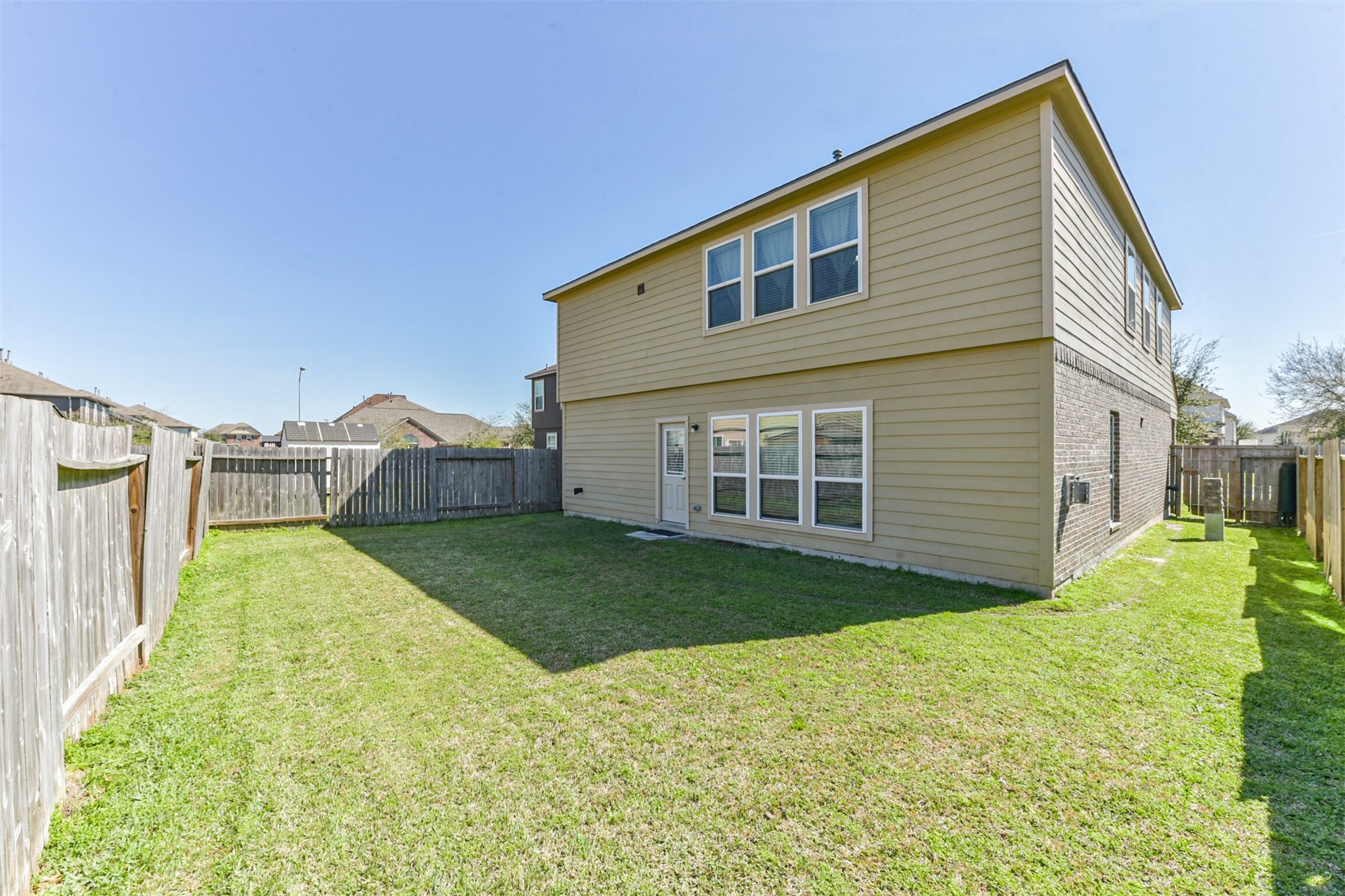 14723 Nickel Plank Road Houston, TX 77049 - Photo 44 of 47 a view of a house with backyard and trees