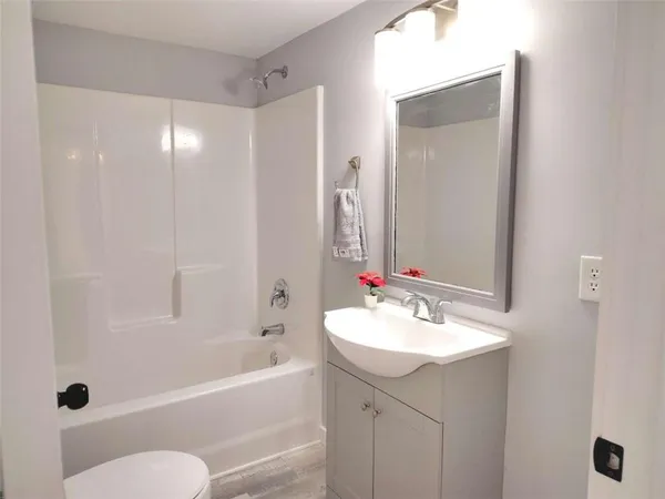 a bathroom with a bathtub