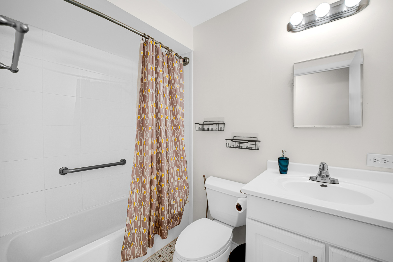 1133 South Finley Road, Unit 310 Lombard, IL 60148 - Photo 15 of 29 a bathroom with a sink a toilet and shower curtain