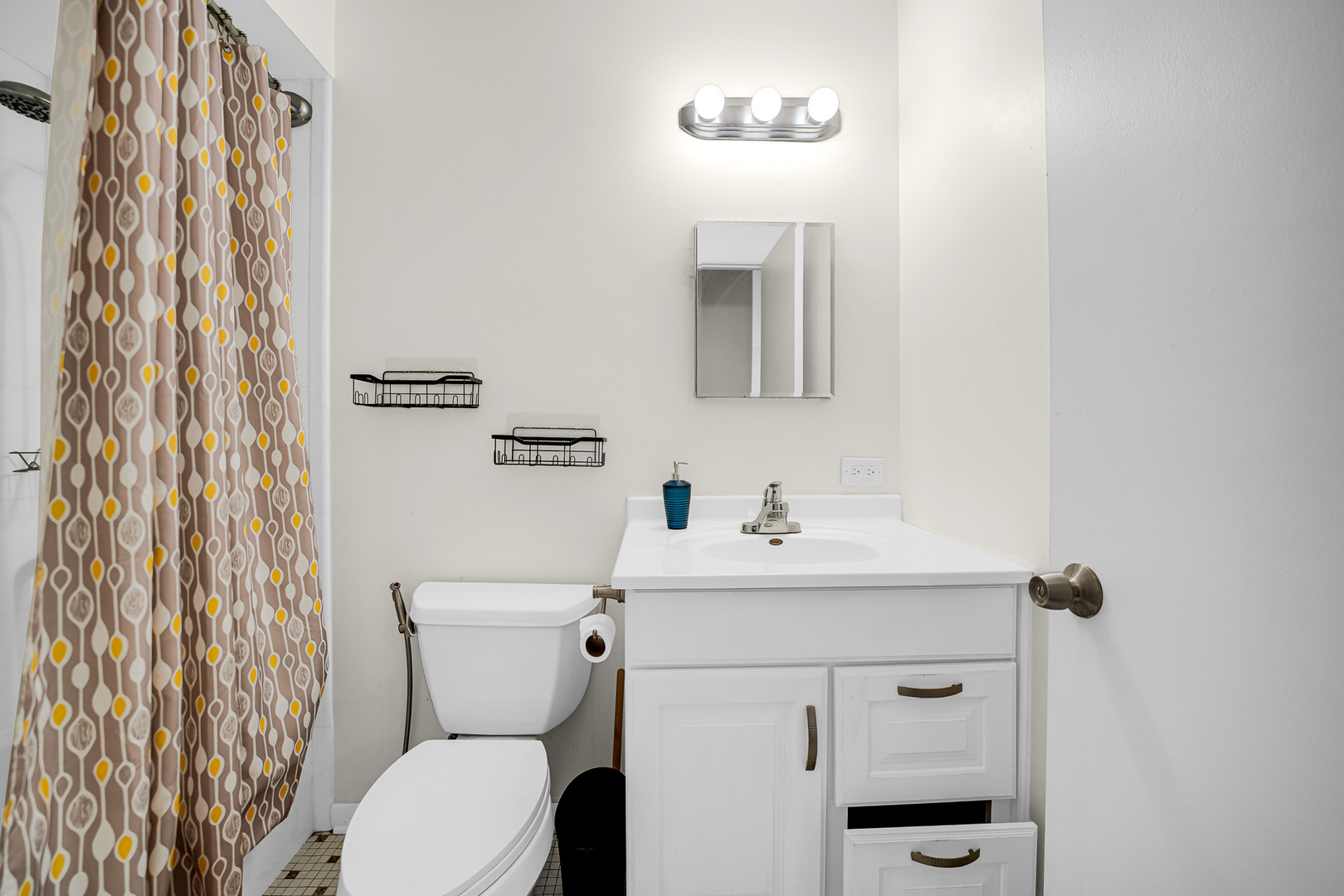 1133 South Finley Road, Unit 310 Lombard, IL 60148 - Photo 22 of 29 a bathroom with a toilet sink and mirror